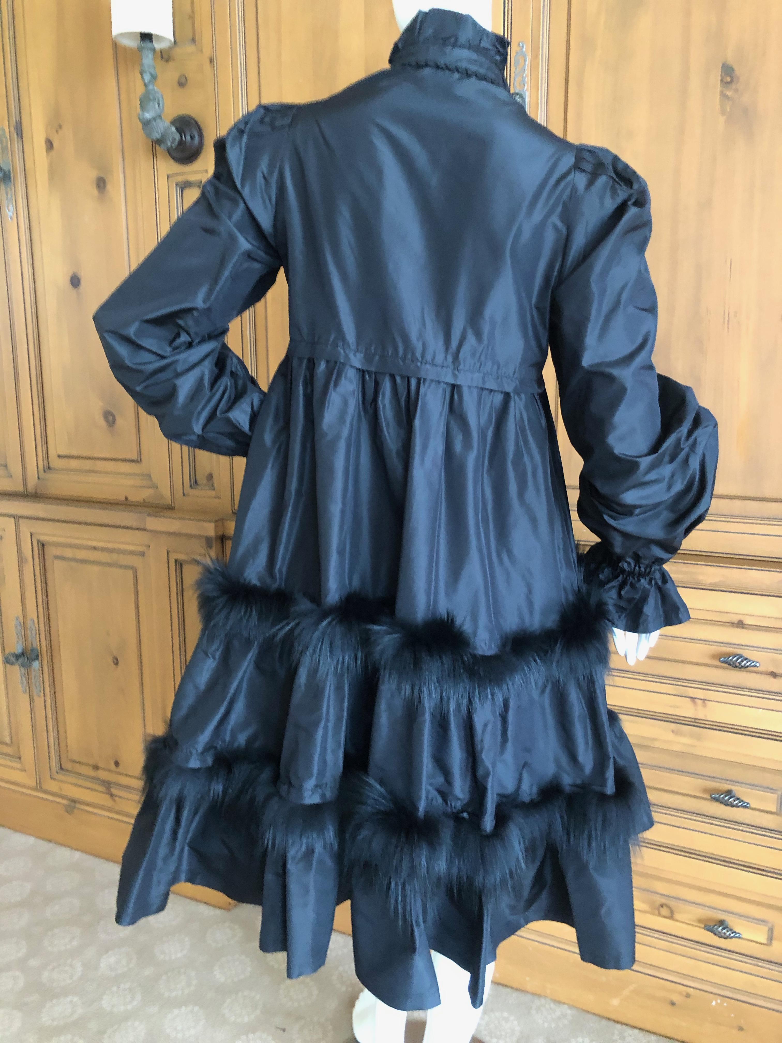 Moschino Vintage Black Silk Taffeta Empire Ball Dress with Fur Trim.
Miles of fabric, the skirt is a full circle.
 Size 8
Bust 36