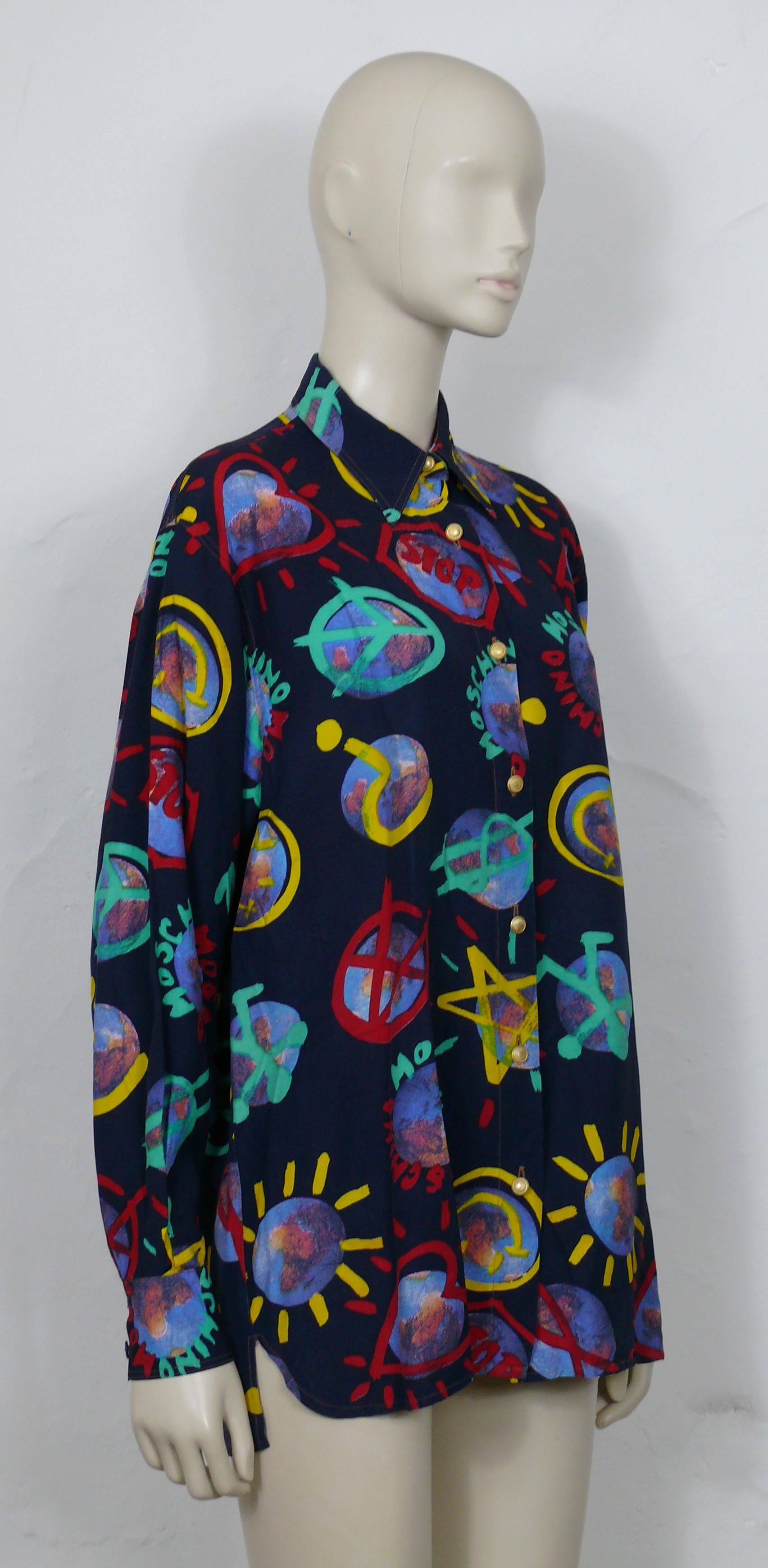 MOSCHINO vintage shirt featuring an opulent multicolor print of Earths and various signs (peace, smiley, anarchy, dollar...) on a navy blue background.

Long sleeves.
Button down closure.
Cuff buttoning.

Label reads MOSCHINO JEANS.
Made in