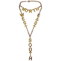Moschino Vintage Gold Toned Cardinal Directions Necklace