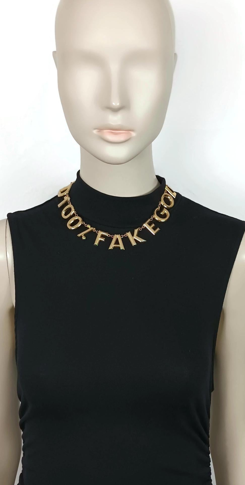 MOSCHINO vintage gold toned chain necklace featuring the slogan 