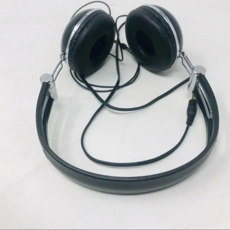 Moschino vintage headphones heart peace sign

Super rare headphones by Moschino with heart on one side and peace sign on the other. Plastic
Great condition and working. We have several pair!