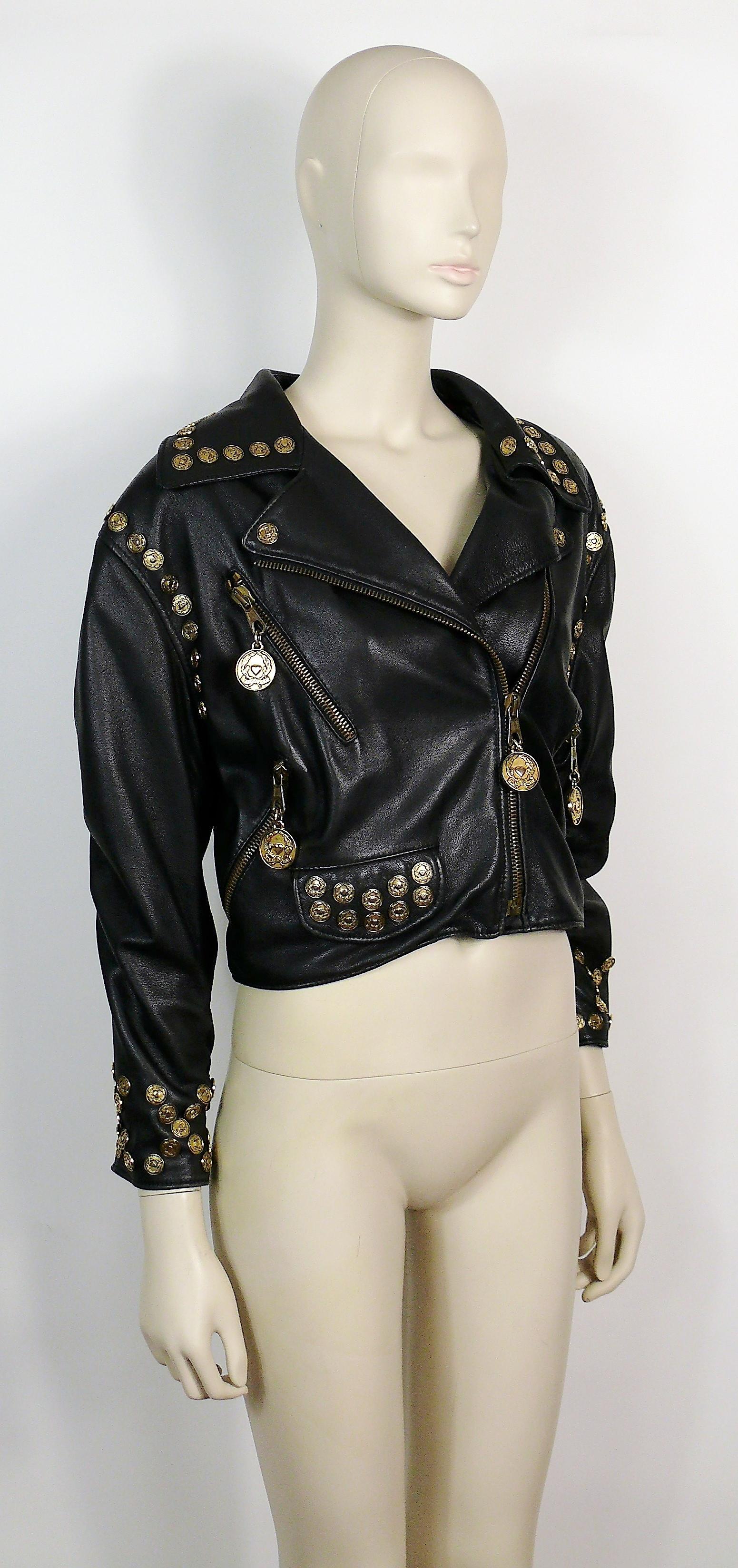MOSCHINO vintage black cropped biker leather jacket embellished with antiqued gold tone coins.

This jacket features :
- Black leather embellished with antiqued CHEAP AND CHIC signature gold tone coins.
- Message 