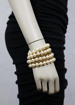 MOSCHINO Manchette vintage multibrins de couleur or avec chaîne et perles