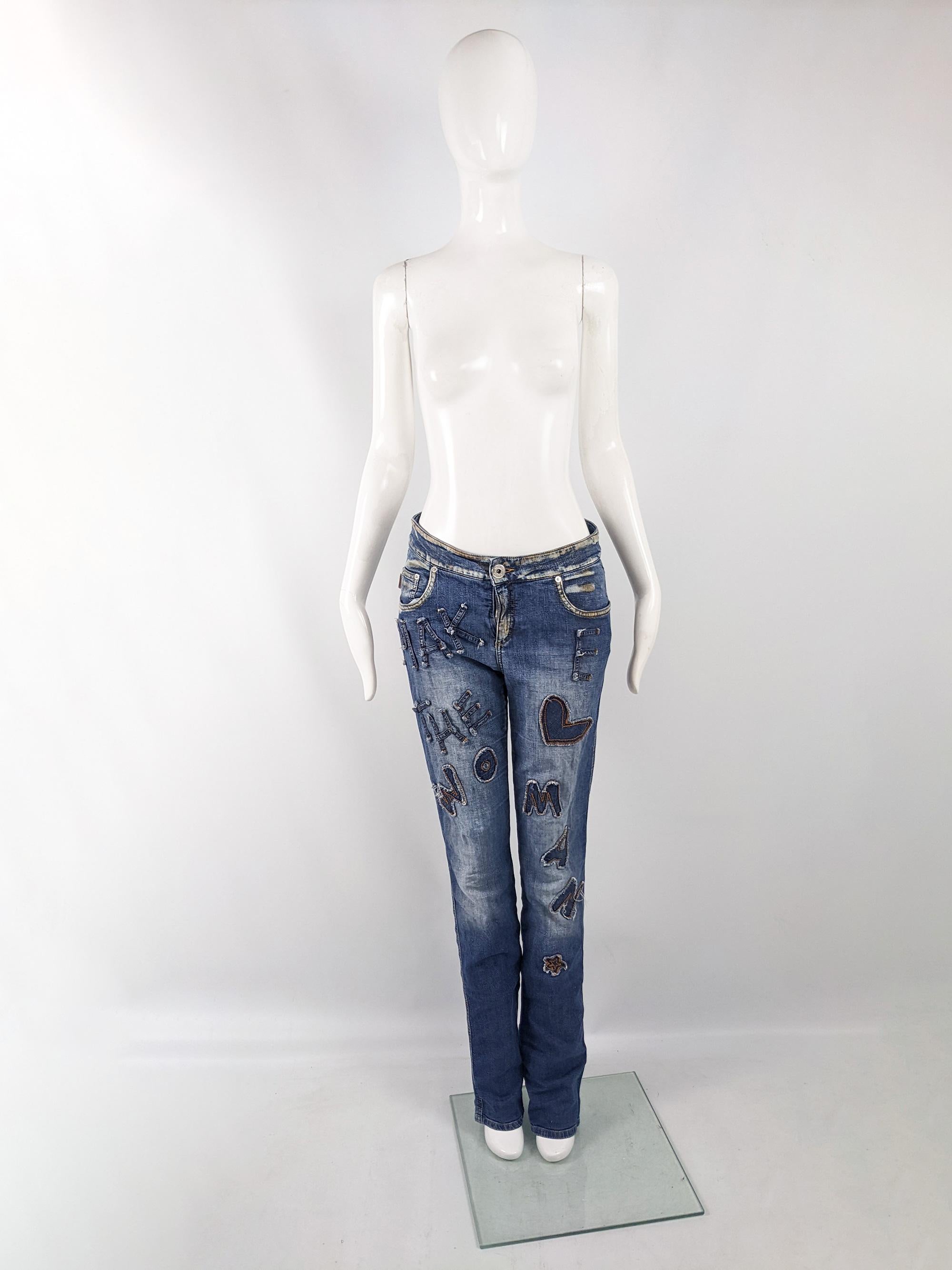 An incredible pair of vintage womens y2k jeans from the early 2000s by luxury Italian designer, Moschino. In a blue denim with a distressed look that is tinted brown in areas to give a grungy touch. They have an incredible silhouette with an extra