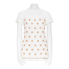 MOSCHINO Weißes, orangefarbenes, floral verziertes Oberteil aus Baumwolle mit Perlen und Kristall IT38