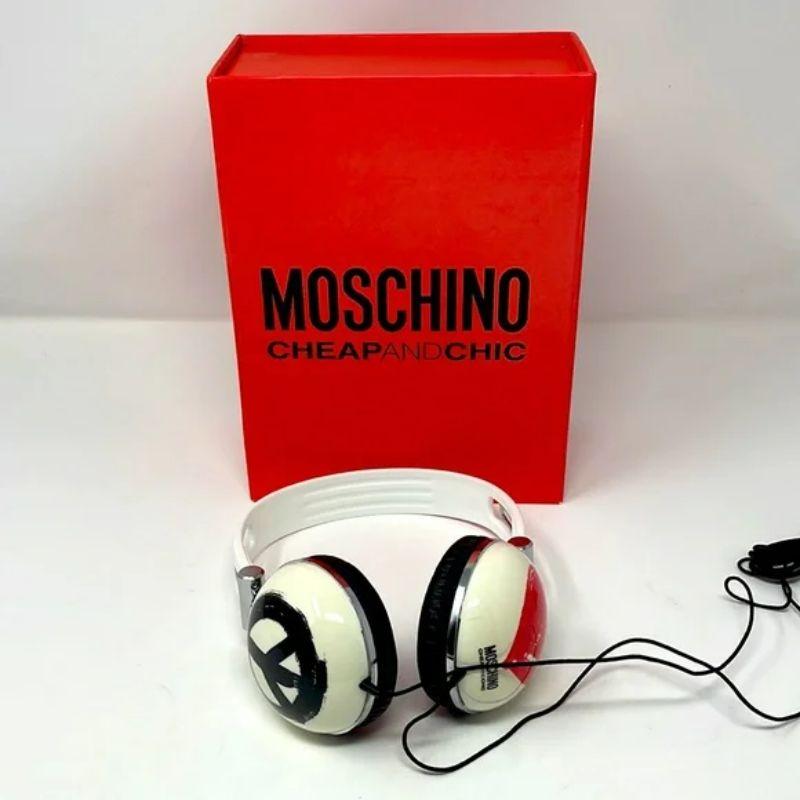 Moschino white heart peace sign headphones

Jazz up your listening using these vintage headphones by Moschino Cheap and Chic. Comes with original box. No dust bag. Plastic and metal.
