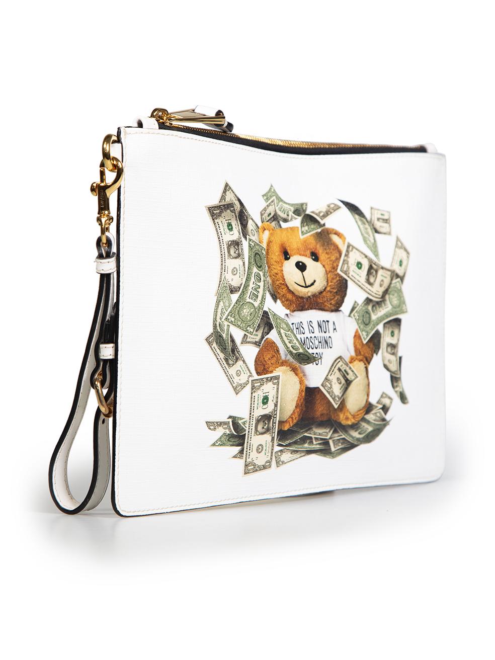 CONDITION is Very good. Minimal wear to clutch bagis evident. Minimal wear to the logo side of the bag with small discolouration on this used Moschino designer resale item.
 
 Details
 White
 Coated canvas
 Medium clutch bag
 Logo and teddy bear