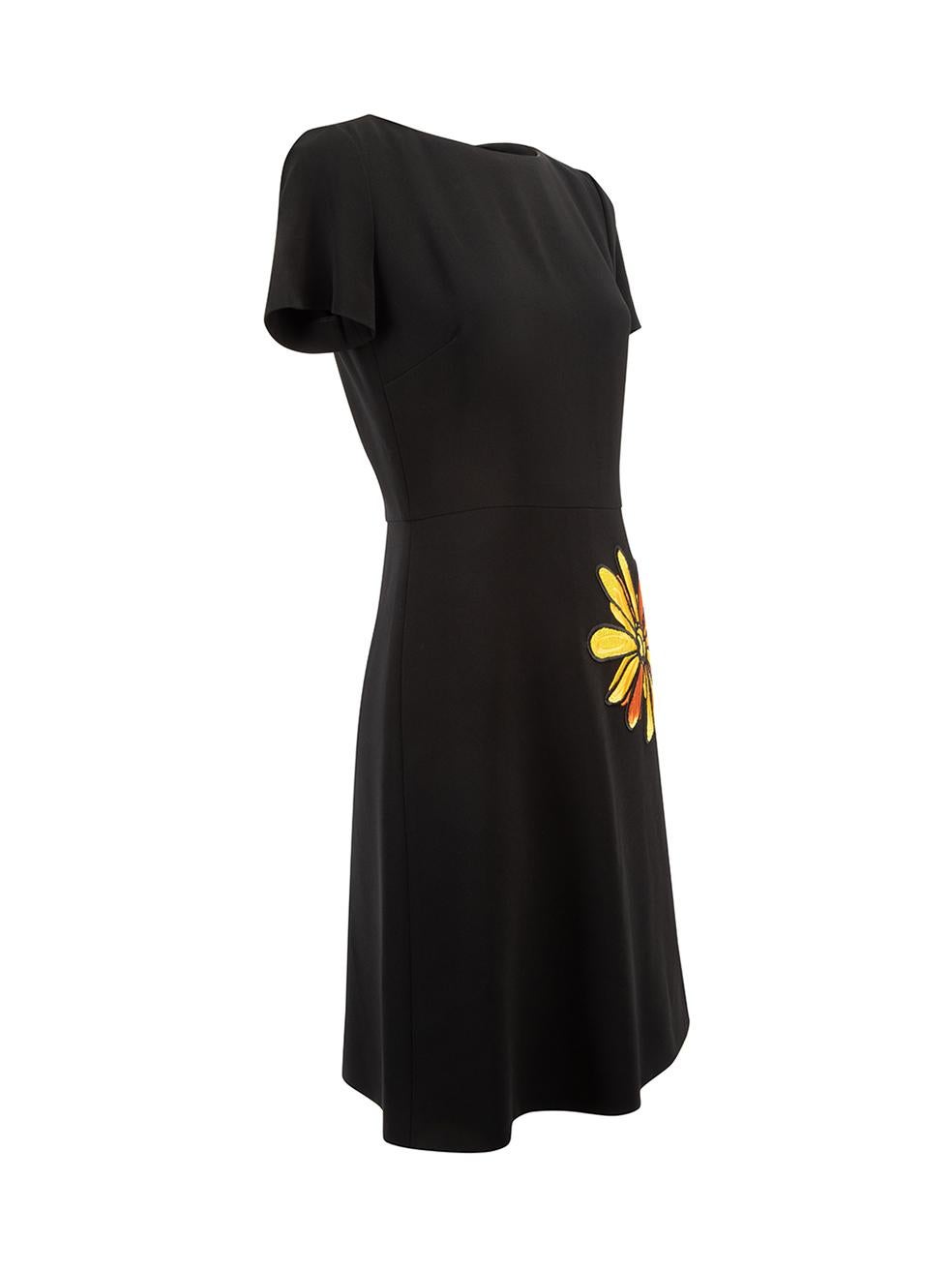 CONDITION is Very good. Hardly any visible wear to dress is evident on this used Boutique Moschino designer resale item. 



Details


Black

Synthetic

Mini dress

Round neckline

Flower embroidered detail

Back zip closure





Made in