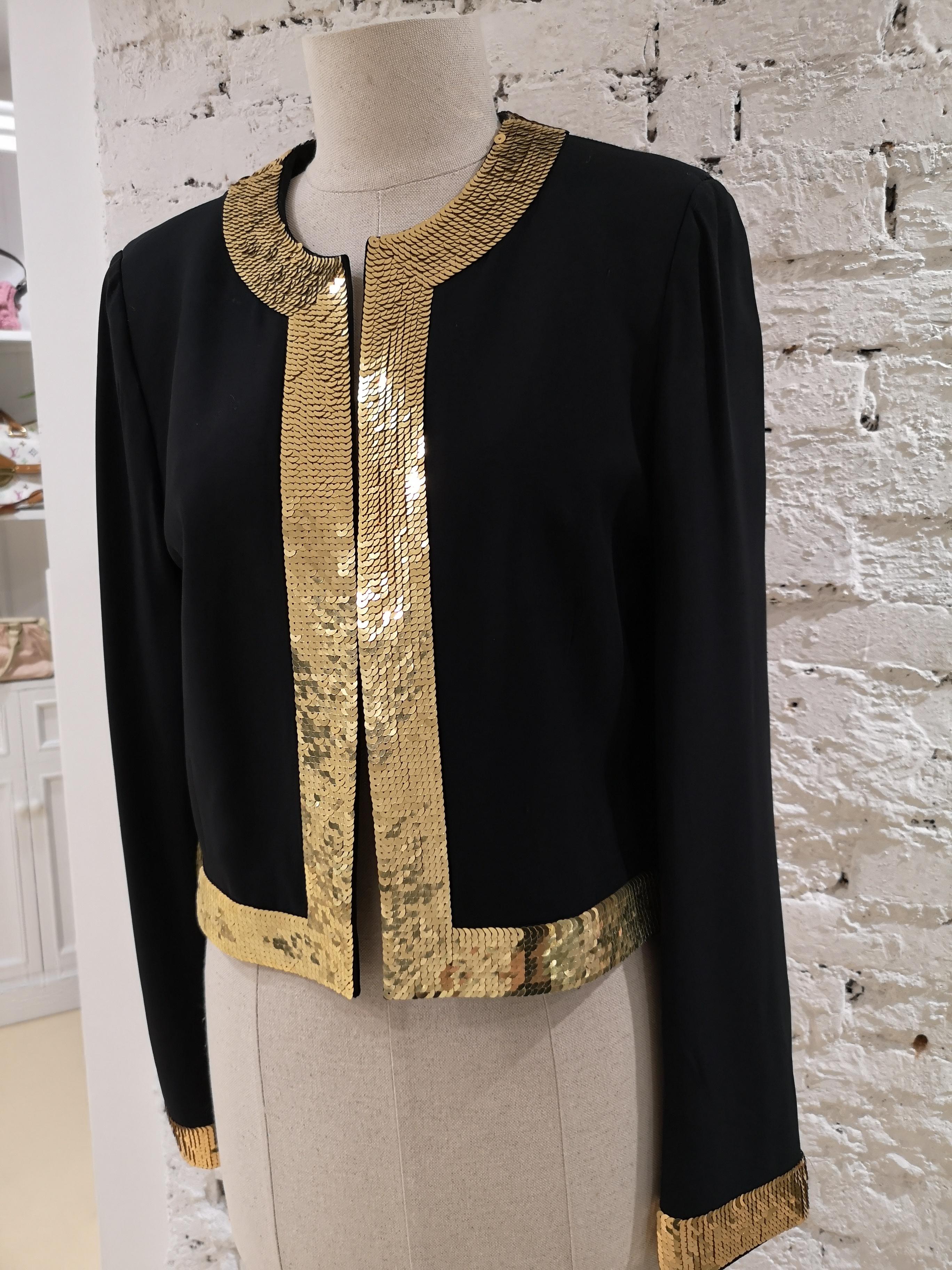 Moschino Wool Black Jacket Gold Sequins
totally made in italy in size 44
composition: wool
