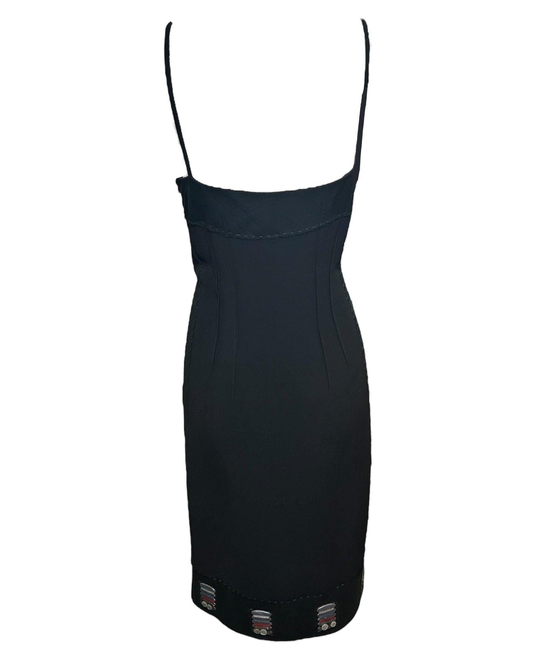 This quirky and sexy dress has all of the Cheap & Chic charm with subtle detailing. The on-the-go sewing kits that line the bottom hem are an adorable and fashionable addition to the classic little black dress. Following a semi-1950s inspired lead,