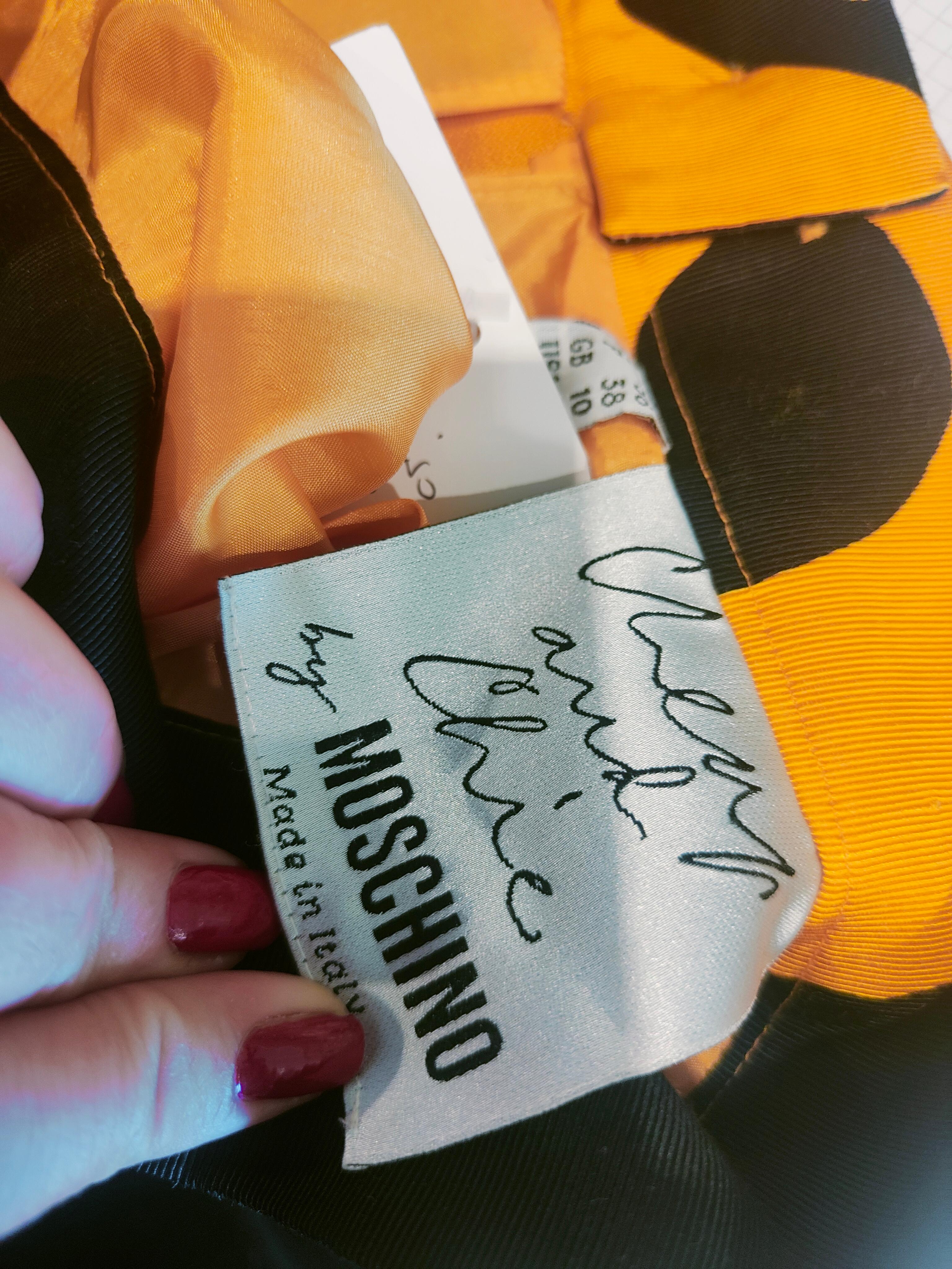 Moschino Jaune Jupe noire Unisexe en vente