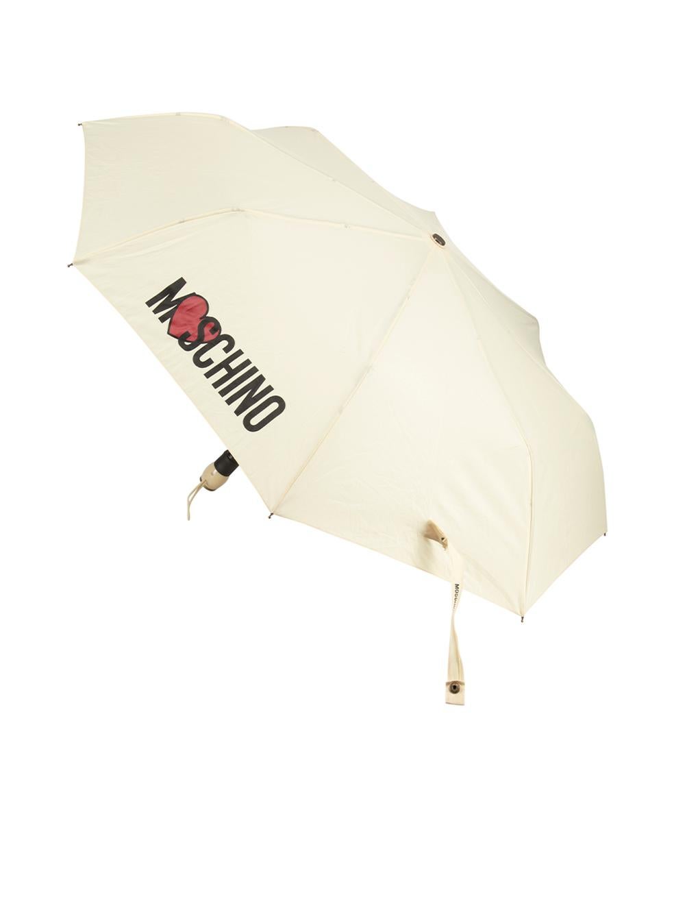 CONDITION is Good. Minor wear to umbrella is evident. Light wear to the exterior with discoloured marks. The handle also has scratches to the metal and the original cover is missing on this used Moschino designer resale item.
 