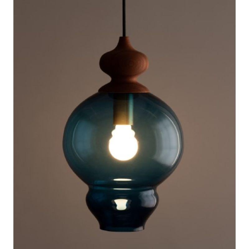 Moscow pendant light by Lina Rincon
Dimensions: 60 x 30 x 30 cm
Materials: Blown glass, oak wood

All our lamps can be wired according to each country. If sold to the USA it will be wired for the USA for instance.

Colors and dimensions may