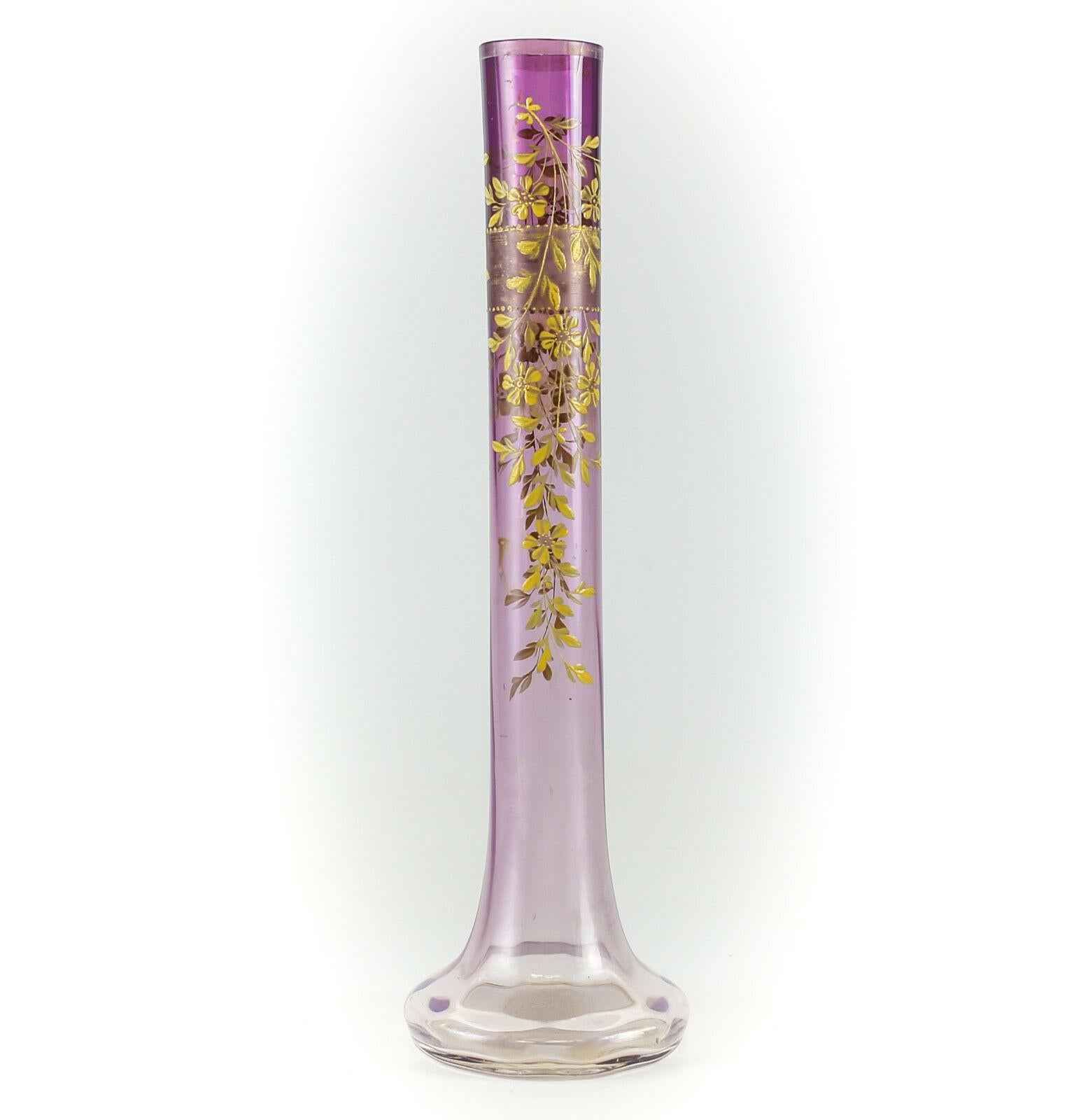 Moser Amethyst Art glass bud vase raised hand painted enamel & gilt.

Moser Vase - Lovely Amethyst colored Art Glass fades to clear. With heightened Hand painted Enamel flowers with gilt leaves. Marked 'Moser' on underside in gilt.

Additional