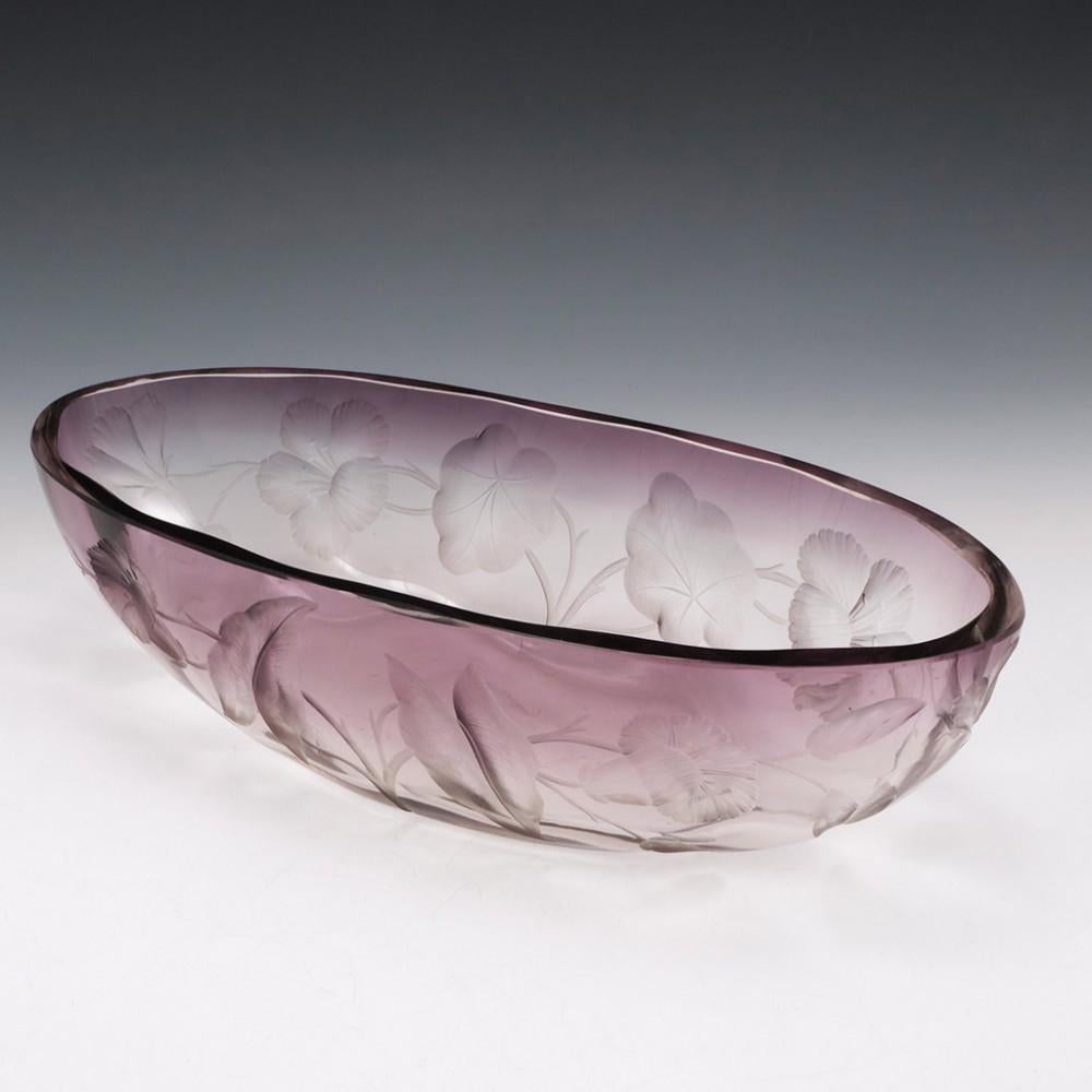 Moser Amethyst Glass Intaglio Cut Jardinière, 1900-05

Additional information:
Date : 1900-05
Origin : Karlsbad, Bohemia
Bowl Features :
Marks : Signed Moser Karlsbad
Type : Intaglio cut lead glass
Size : W 15 x L 35 x H 9.5 cm
Condition :