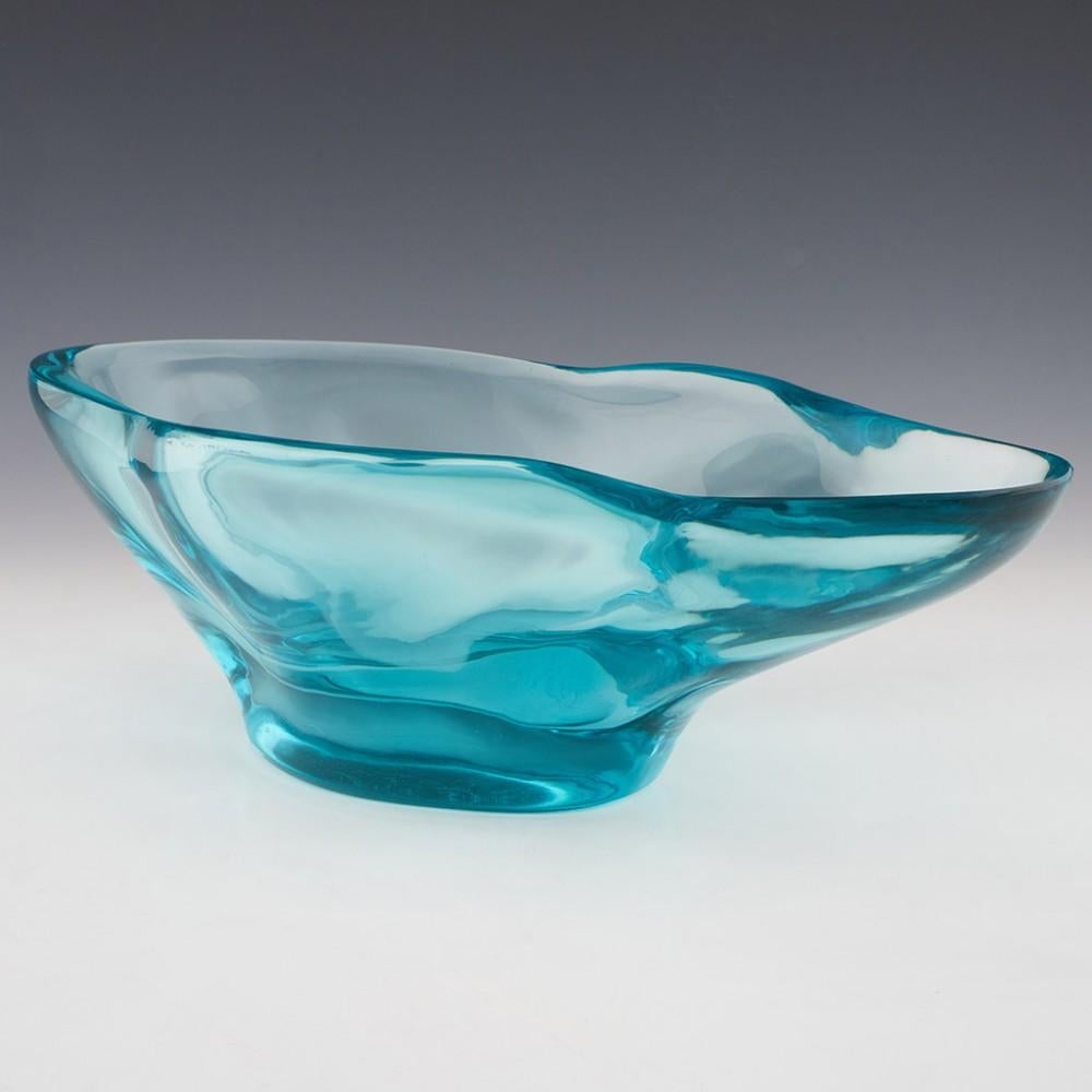 Heading : Biomoprhic Beryl Bowl by Vera Liskova
Date : c1950
Origin : Karlsbad, Czechoslovakia
Bowl Features : Turquoise glass, known as Beryl, with organically curving walls.
Type : Lead
Size : 12.2cm height, 35.5cm length, 20.5cm width
Condition