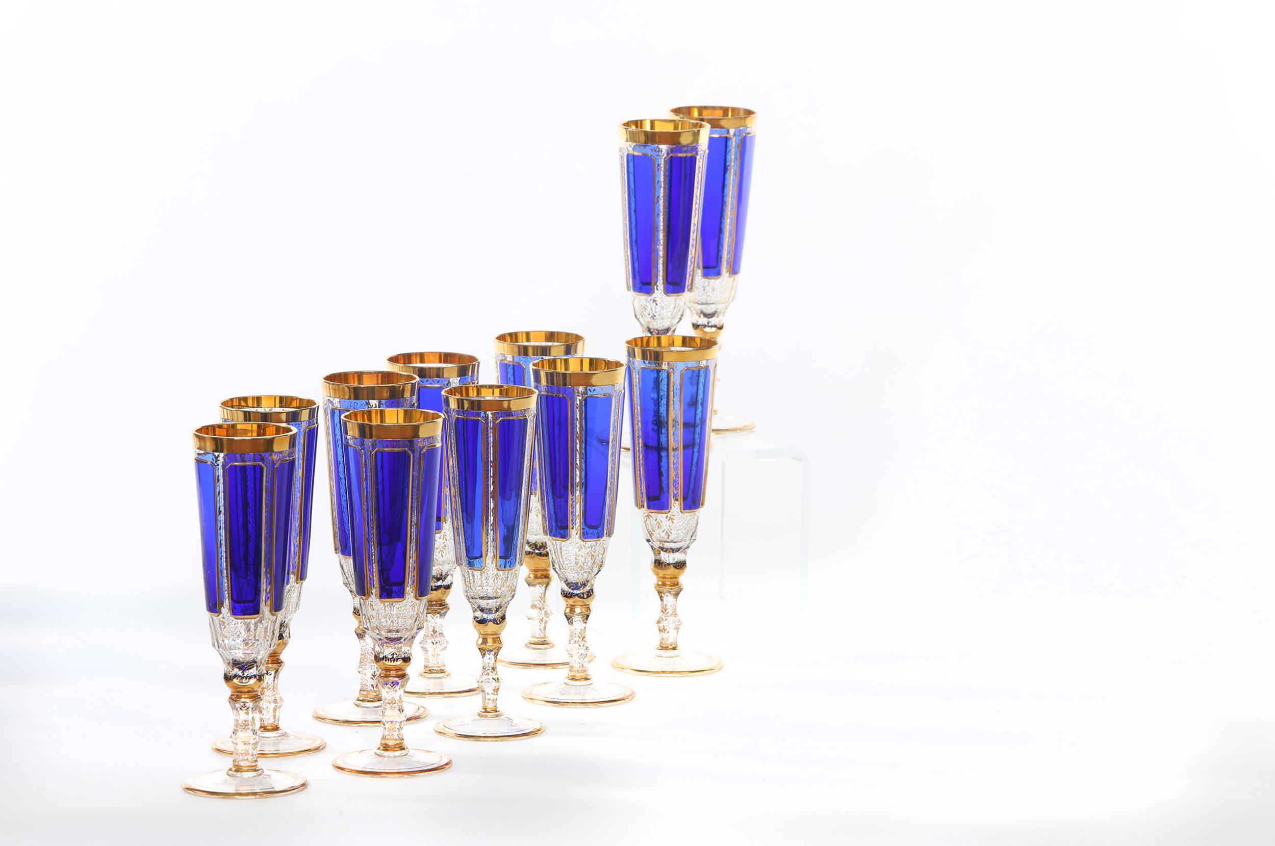 Moser crystal Barware / tableware Bohemian hand blown panel cut cobalt blue with gold design details champagne flutes glassware service for eleven people. Each glass is in great vintage condition. Minor wear consistent with age / use. Each glass