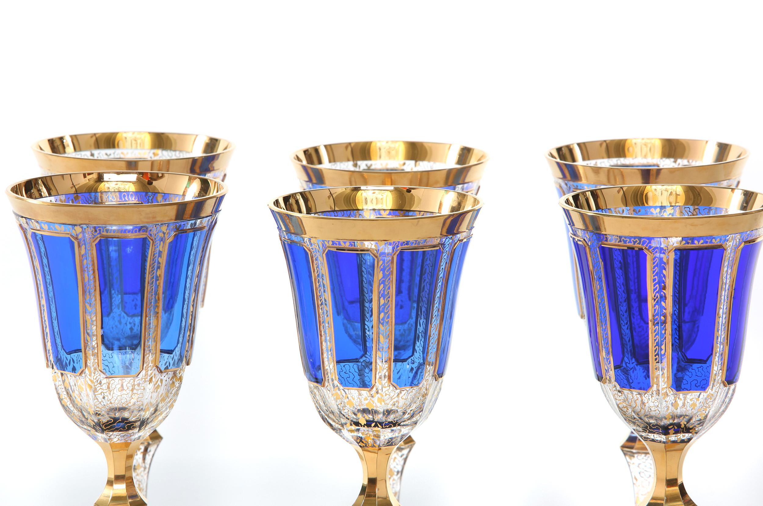 Moser crystal Bohemian hand blown panel cut cobalt blue with gold design details wine / water glassware service for six people. Each glass is in great vintage condition. Minor wear consistent with age / use. Each glass stands about 8.4 inches tall x