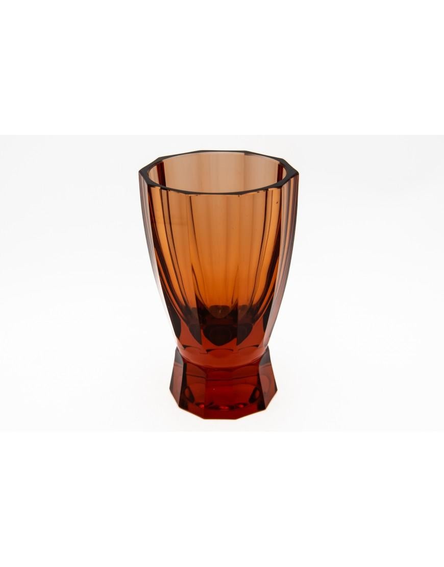 An elegant crystal vase from the Czech manufacturer Moser from the 1960s. Very good condition, no damage. Color: red~`orange.

Dimensions: height 18cm; diameter 11cm.