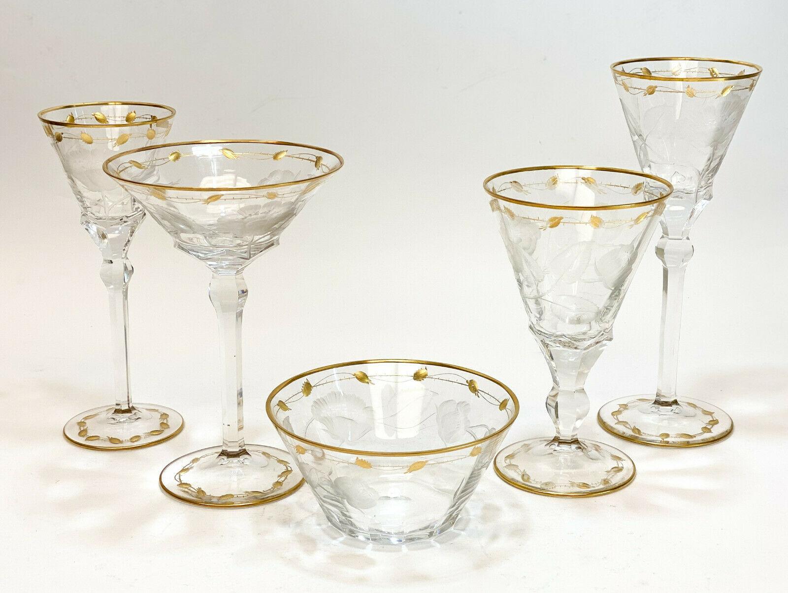 30-piece Moser cut glass and gilt drink-ware service goblets in Paula service for 6. Cut floral designs with a multi-sided stem. Gilt to the rims with leaf swags.

The service includes:
- 6 small wine goblets
- 6 claret wine goblets
- 6 martini