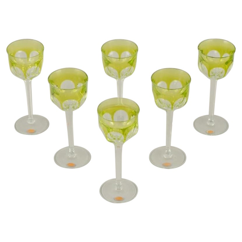 Moser, Czech Republic. Six tall white wine glasses in clear and green glass