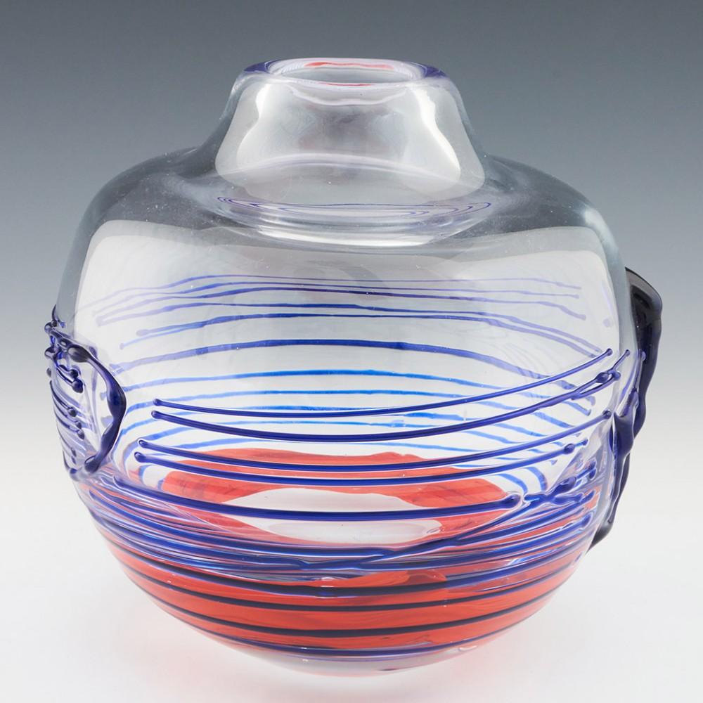 Moser Large Ball Vase Designed by Jiri Suhajek, 1973

Additional information:
Date : Designed 1973
Origin : Karlsbad, Czechoslovakia 
Bowl Features : Clear glass with blue trailing to the exterior and internal red enamel decoration.
Type :
