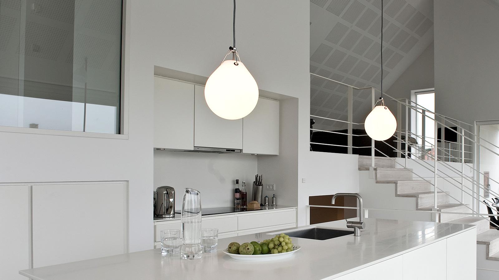 Large Moser pendant by Anu Moser for Louis Poulsen. Hand blown three-layer white opal glass pendant. The Moser pendant is an extremely honest product, where all the parts - except the light source itself - are clearly visible. The original