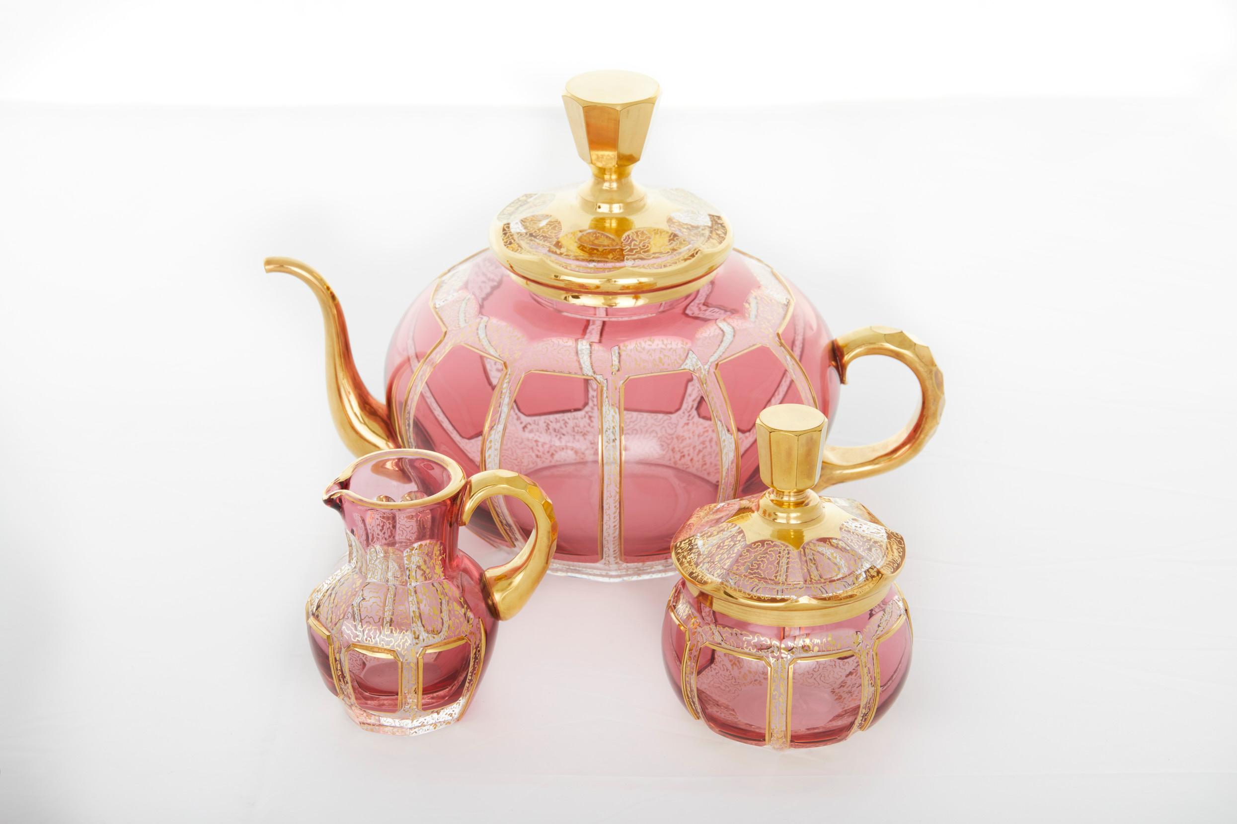 Beautiful and exquisite Moser Enameled Pink paneled with gilt gold design tableware serving tea / coffee service for six people. Each piece is in great condition. Minor shelve wear underneath. No flaws observed, the decoration is bright & intact.