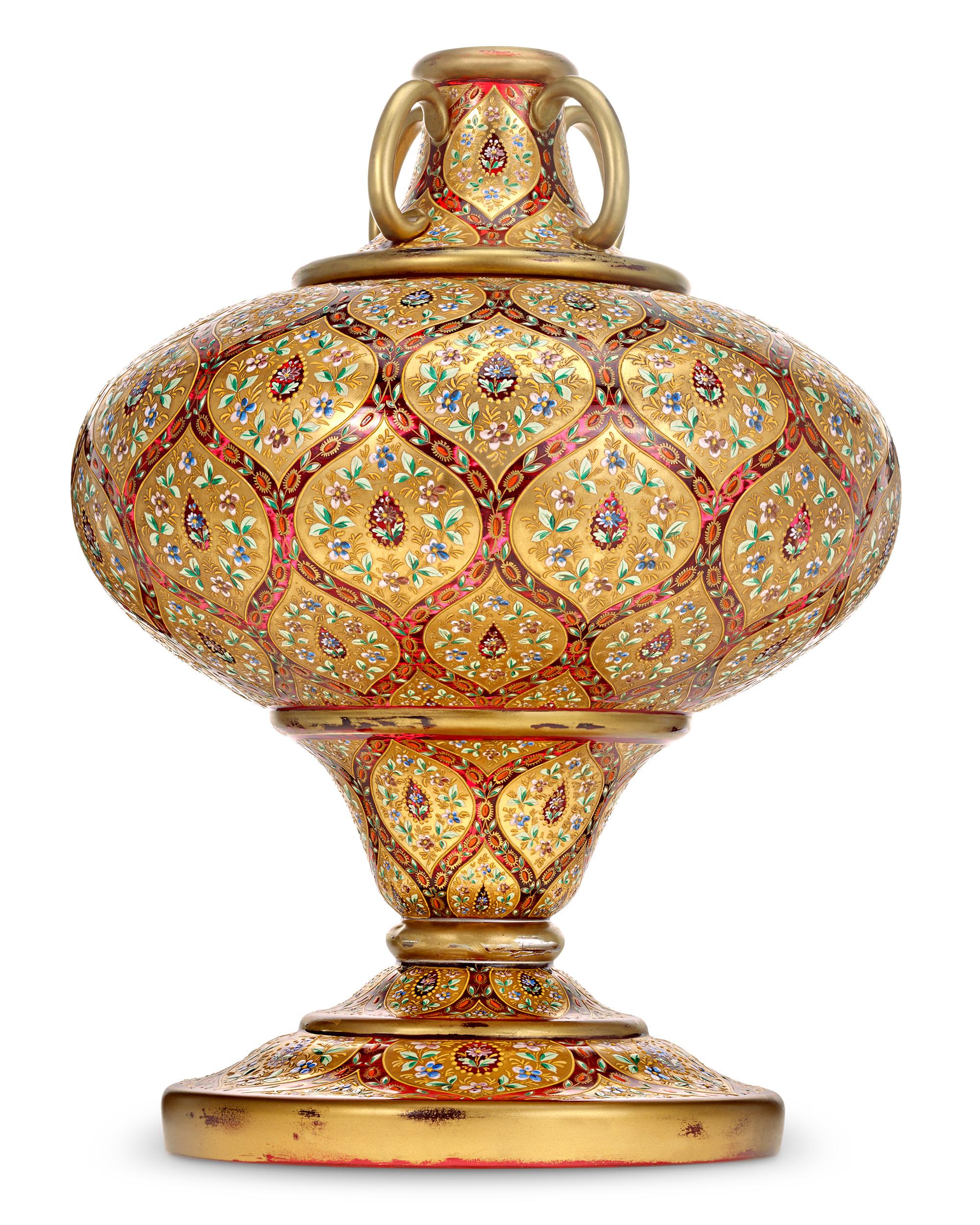 Rose Petal Jar
Moser
Circa 1890

This monumental Moser glass rose petal jar is an extraordinary example of late 19th-century Persianate design. The large, footed, bulbous urn features an expanding middle section on a domed circular foot, lavishly
