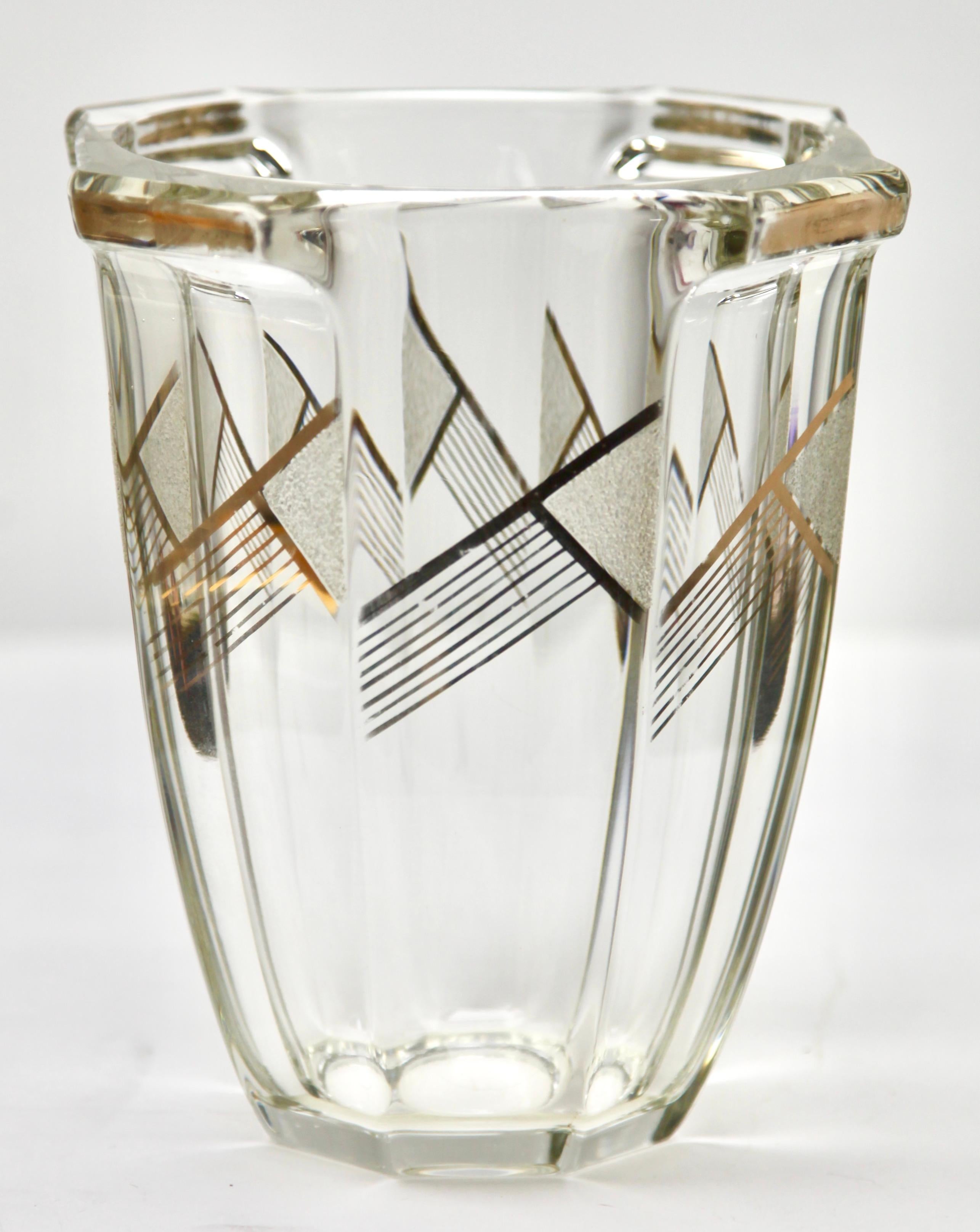 Ludwig Moser & Söhne Karlsbad. 
Signed: GERMANY
Heavy crystal clear faceted vase with eight facets.

A beautiful example of Post-war deco design and an early example. 
This midcentury rectangular vase has been made, with abstract/geometric