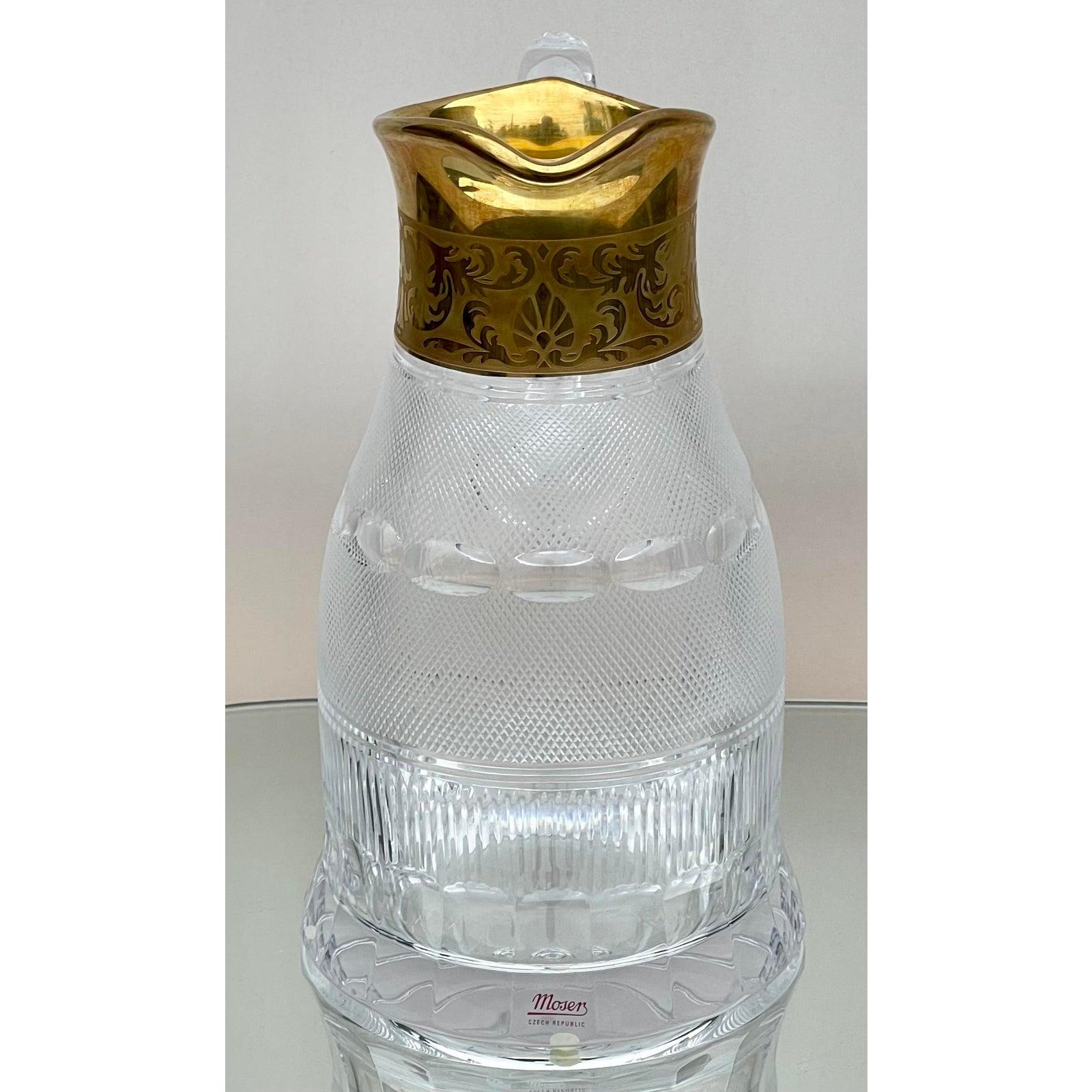 Moser Splendid Gold Encrusted Crystal 50 Ounce Pitcher

Additional information:
Materials: Crystal, Gold
Color: Gold
Brand: Moser Glassworks
Designer: Thos. Moser
Period: 1980s
Styles: Art Deco
Item Type: Vintage, Antique or Pre-owned
Dimensions: