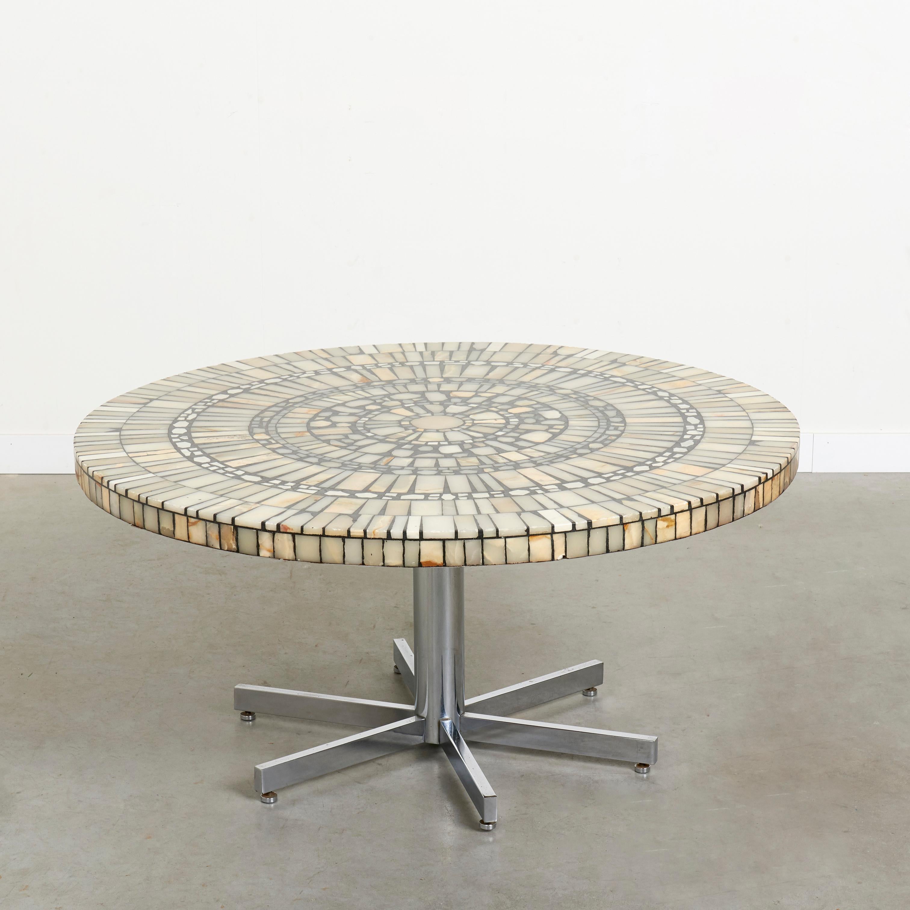 Mid Century coffee table by Heinz Lilienthal, Germany 1960s.
Mosaic marble stone with chrome steel base.
Table is in a good vintage condition. Table edge with small damages all around, see pictures.