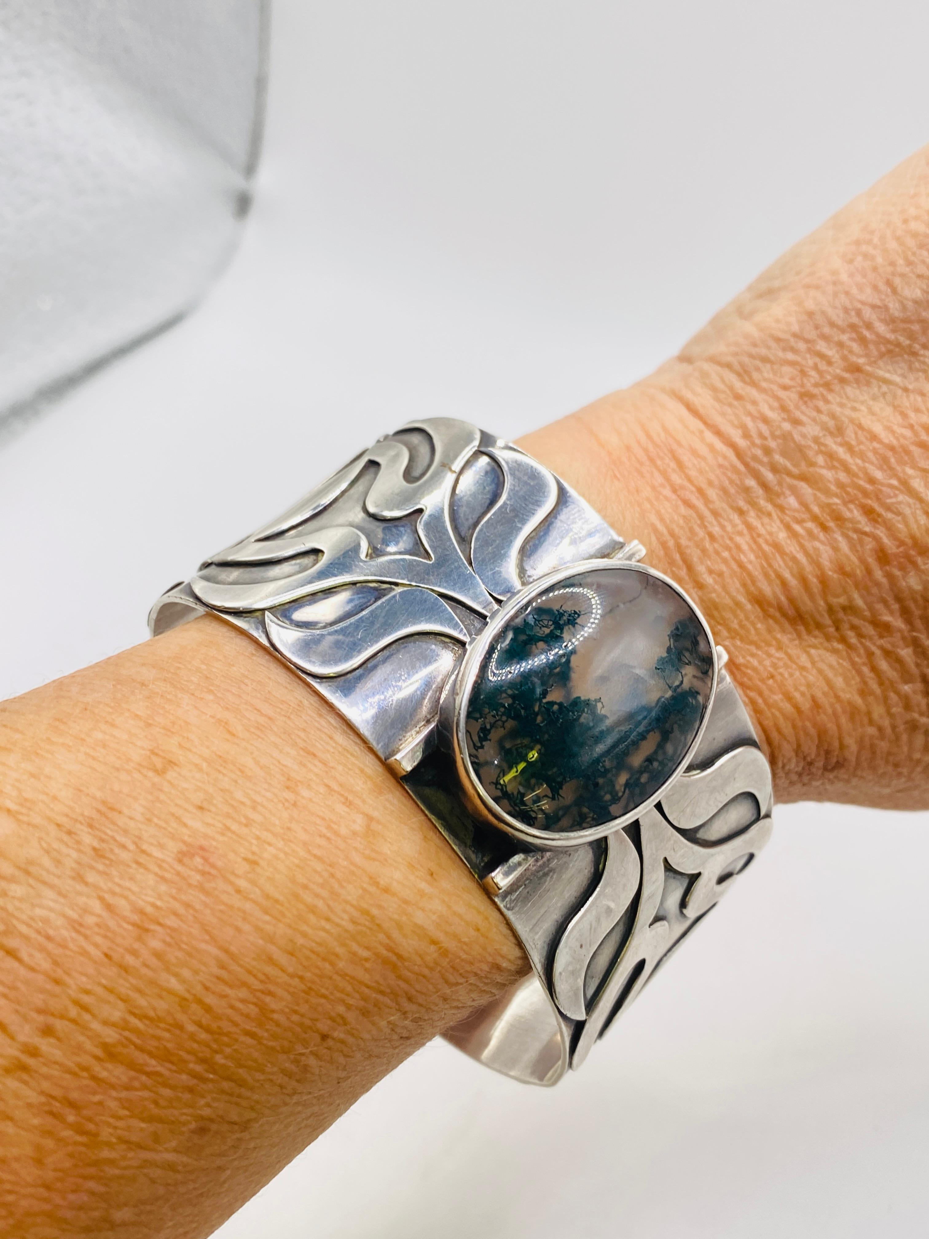 Moss agate sterling silver cuff bracelet. Signed Sari. 42.3Dwt