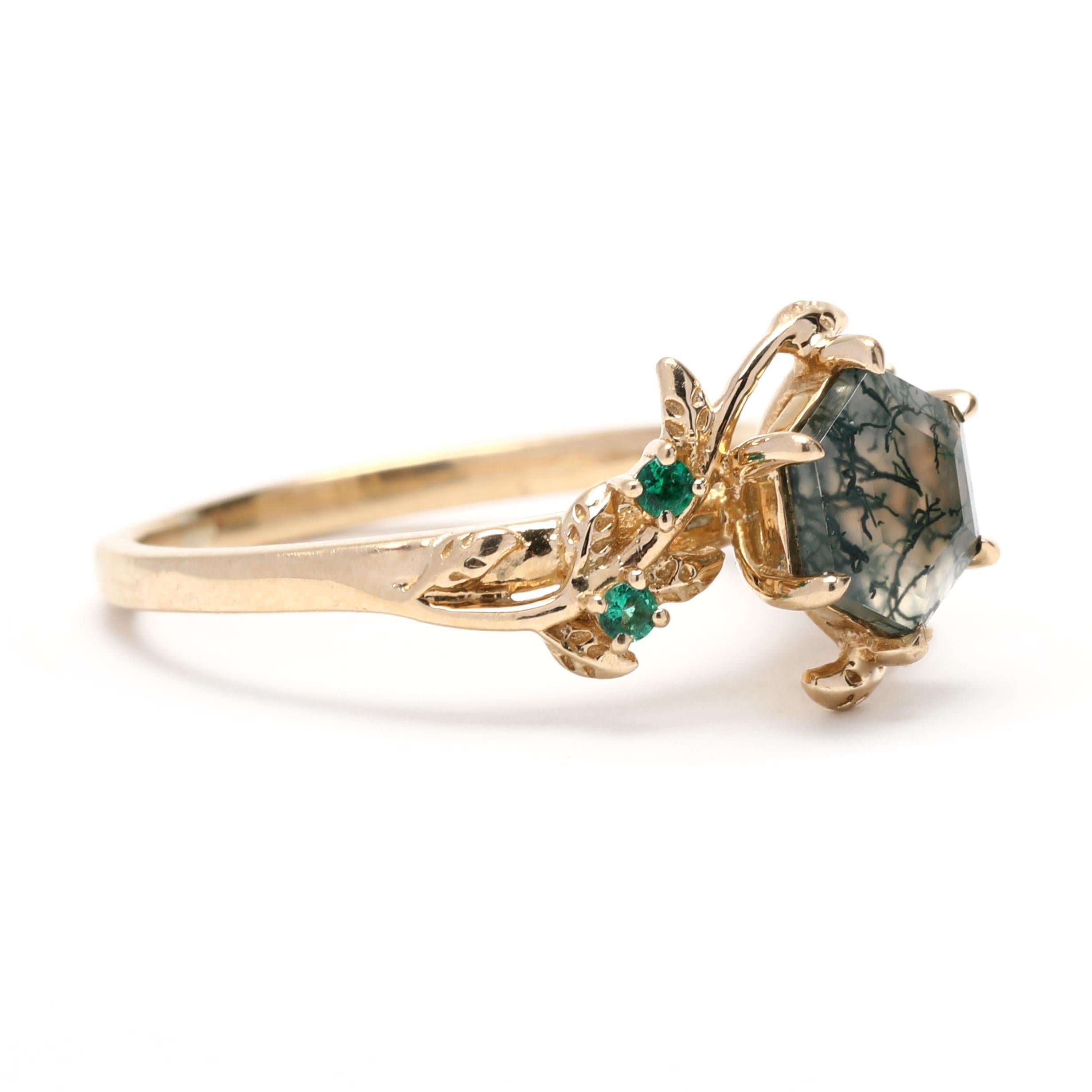Dieser einzigartige Ring aus 10 Karat Gelbgold besticht durch eine einzigartige Mischung aus Moosachat, Tsavorit-Granat und winzigen Diamanten, die ein atemberaubendes, zierliches Blumenranken-Design ergeben. Die Ringgröße ist 5,75 und er ist