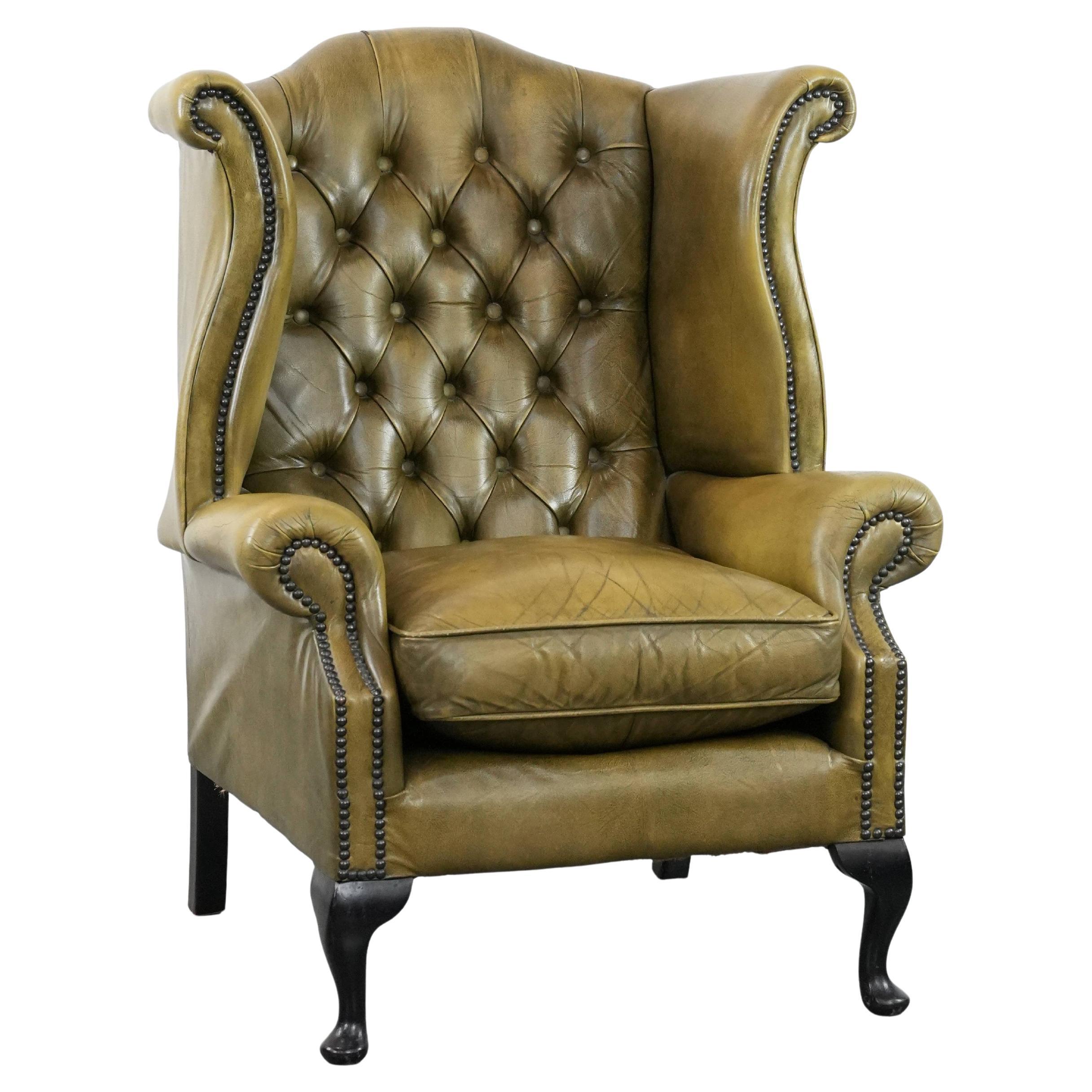 Moss green cow leather Chesterfield wingback armchair in English style