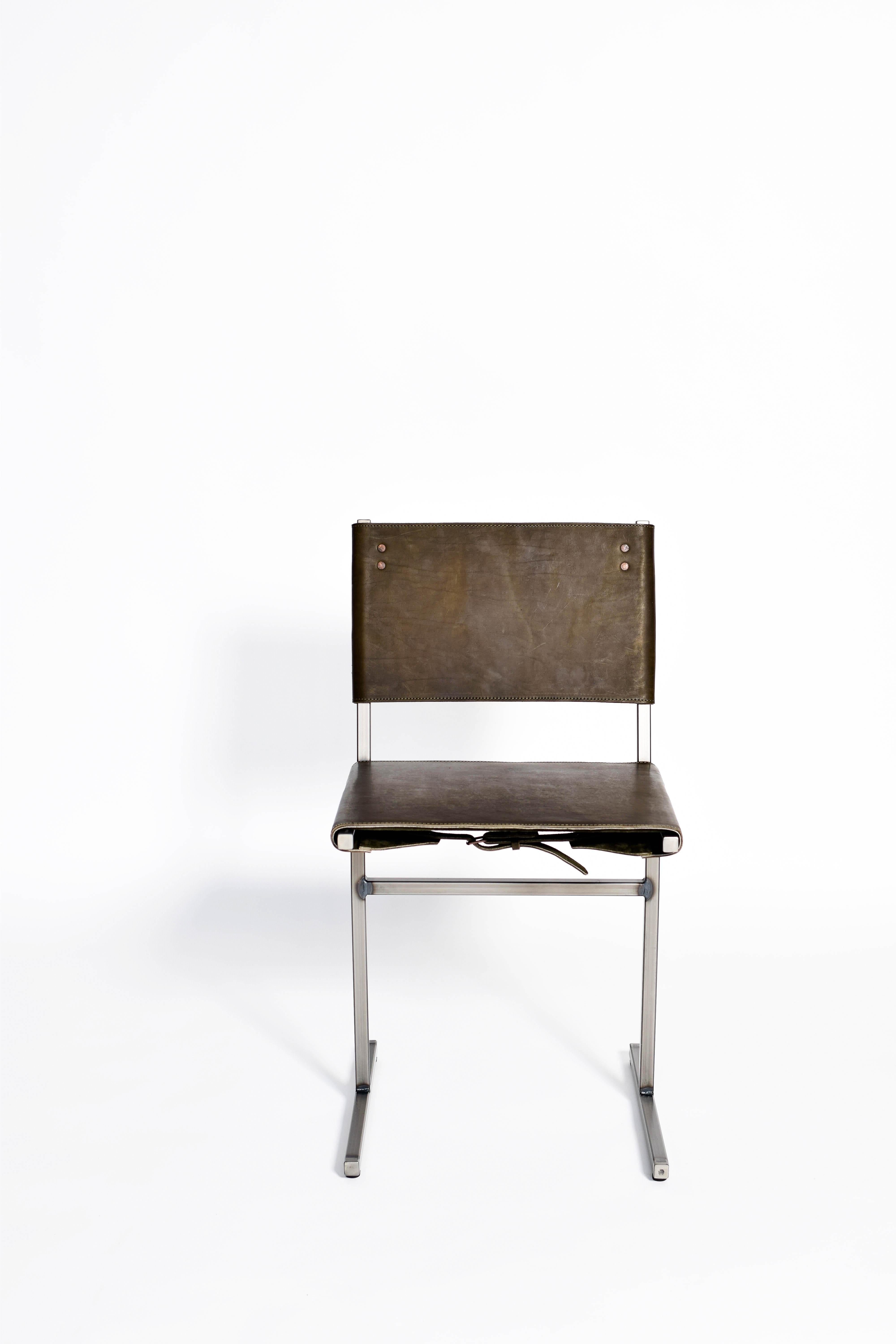 Moss green Memento chair, Jesse Sanderson
Original signed chair by Jesse Sanderson
Materials: Leather, steel
Dimensions: W 43 x D 50 x H 80 cm
Seating height 47 cm

Frame finishes available in brass, bare steel, Matt black.

Five lines and a