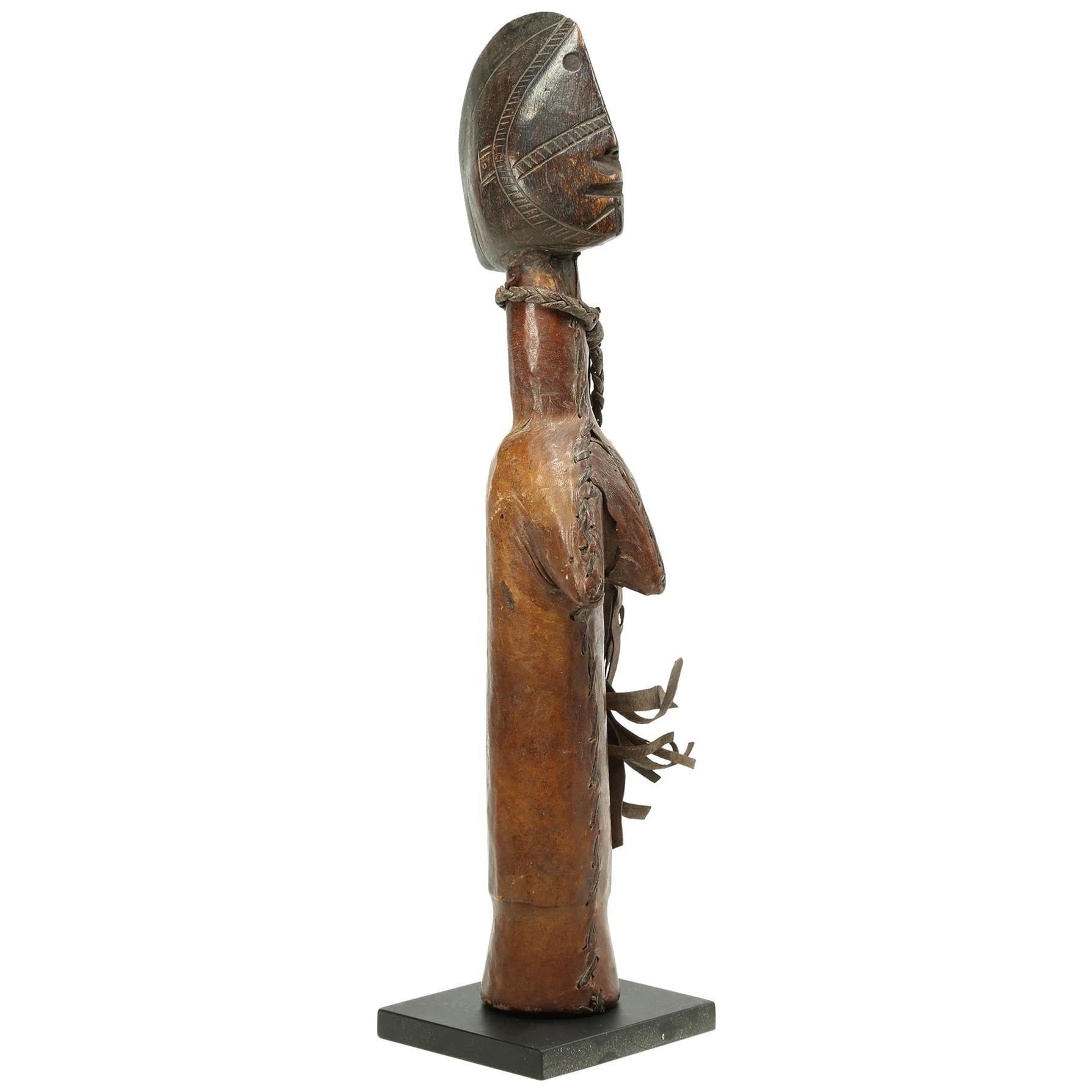 Mossi Doll Burkina Faso, Early 20th Century, Africa Great Stylized Face Leather For Sale