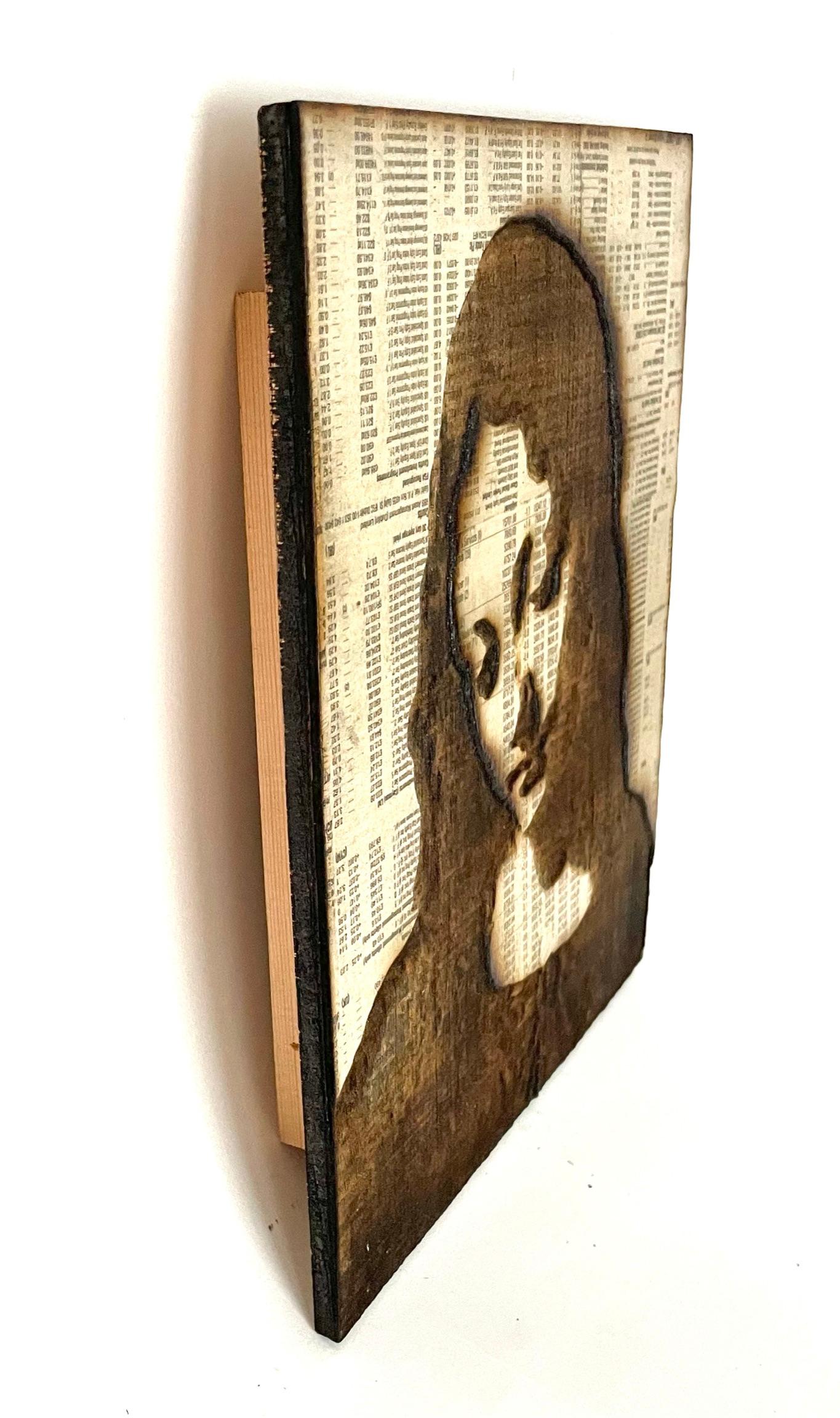 Artwork by Gordon Cheung, Mother, 2009, Laser pyrography, vaporised stock listings on plywood, 21 x 17 x 2cm

The laser pyrographic etchings are layered with financial newspaper before the image is scorched into the surfaces to create a smoky and