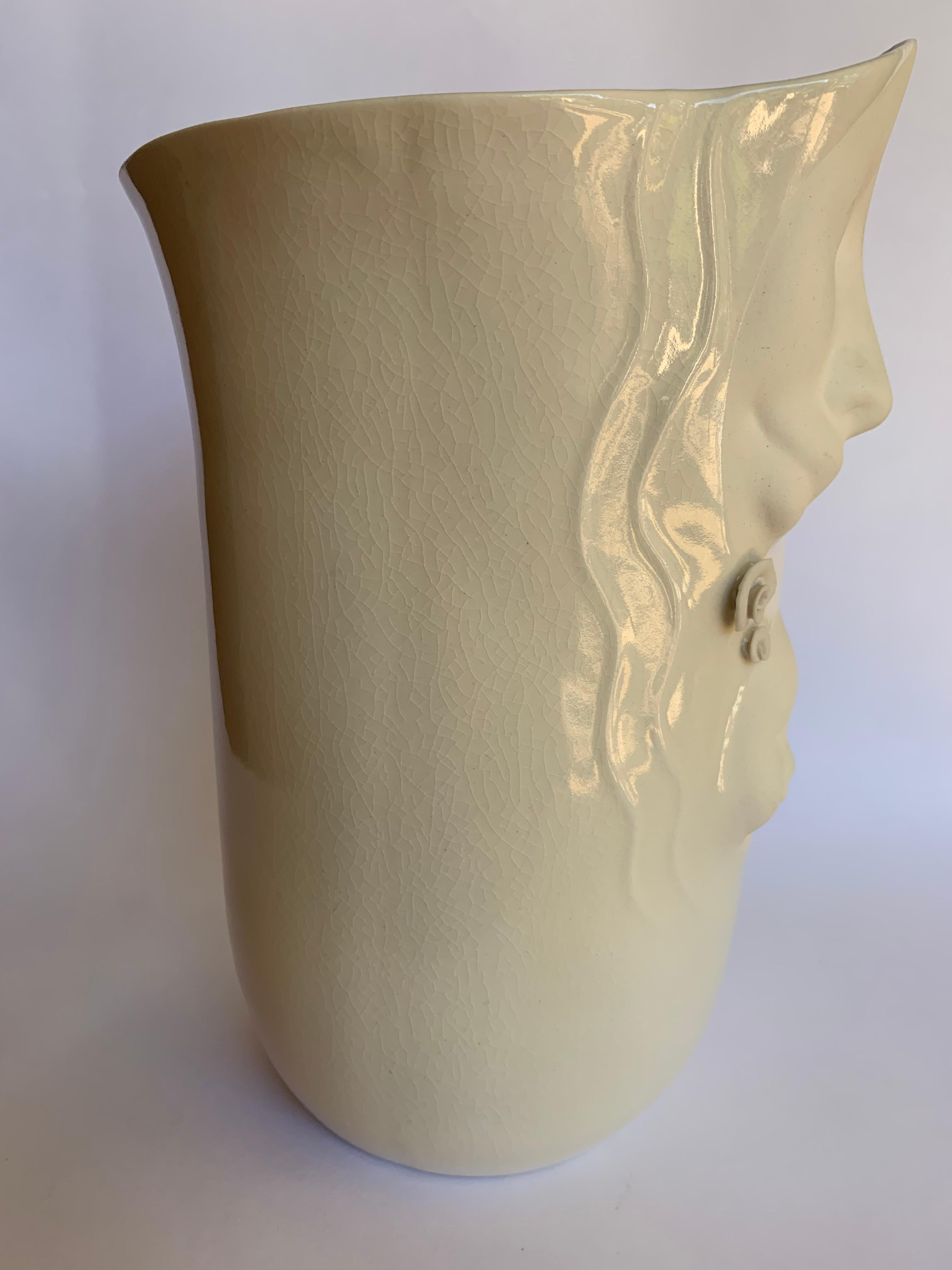 Mother and child figurative ceramic vase by Lund. A beautiful embrace between mother and child, makes this a wonderful sculpture and vase.