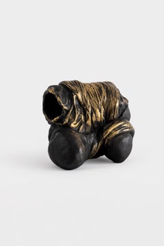Mother, contemporary sculpure in cast bronze, black patina