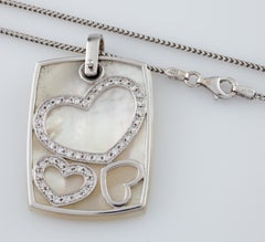 Mother of Pearl and Diamond Heart Pendant Set in 14 Karat White Gold with Chain