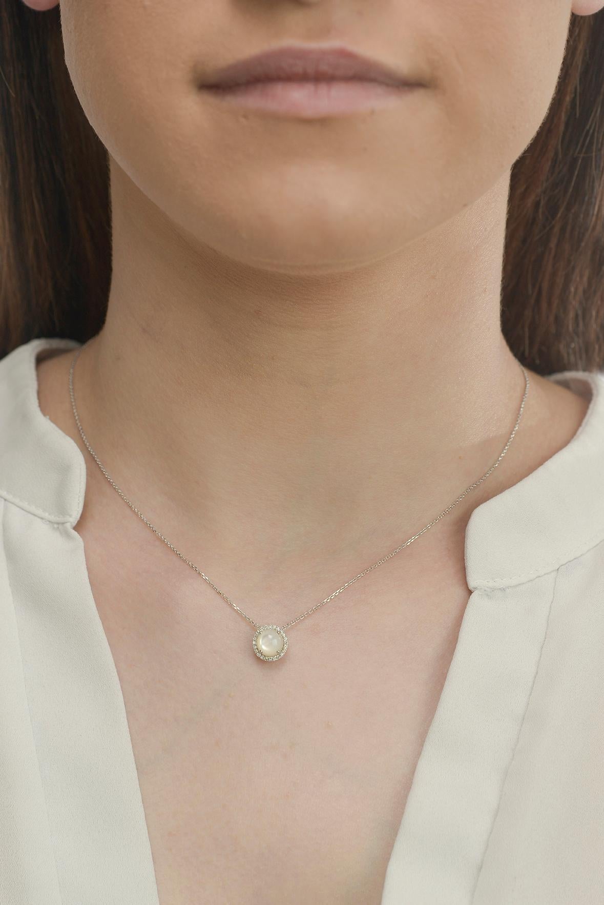 Mother of Pearl and diamond necklace in 14 k white gold.