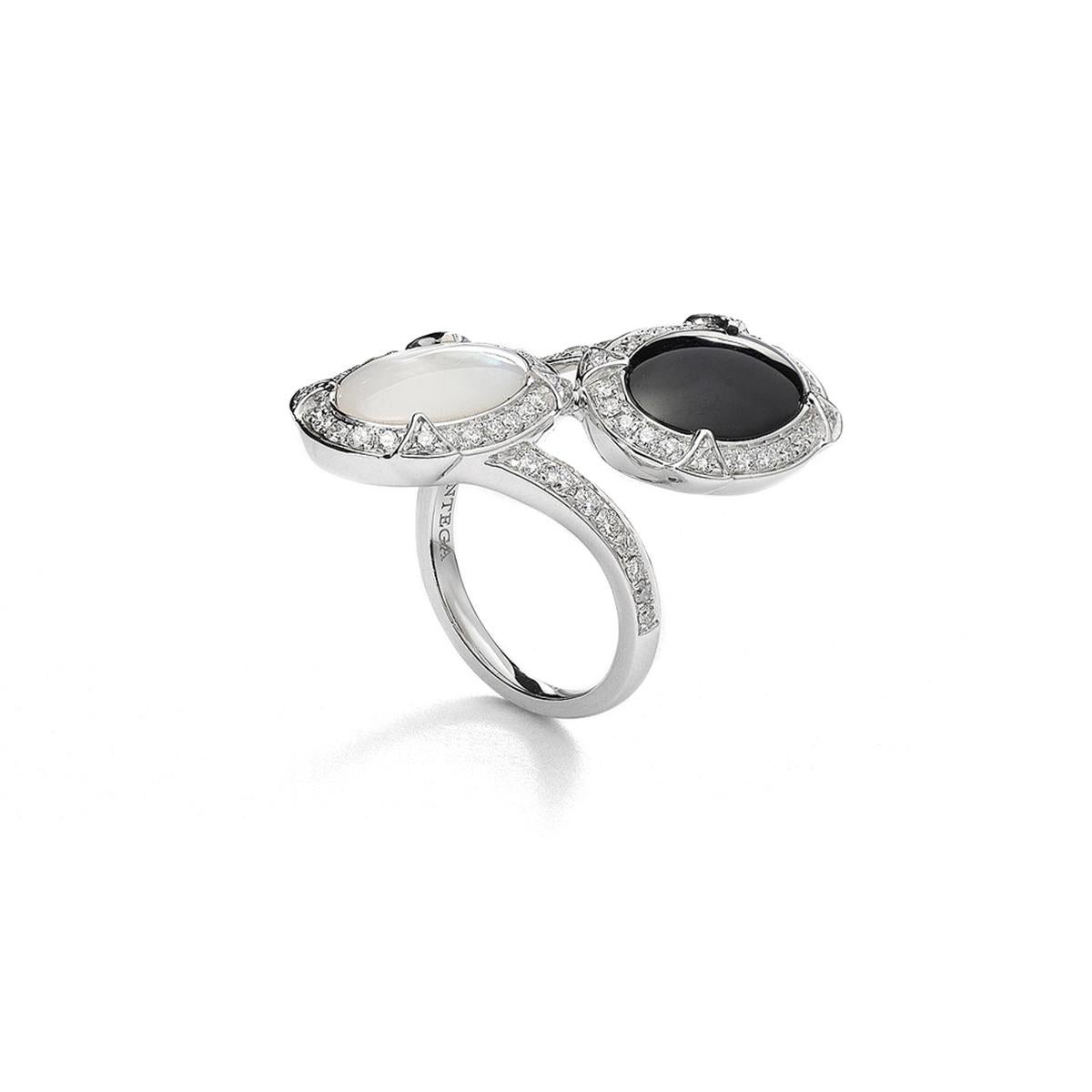 Ring in 18kt white gold set with 52 diamonds 0.49 cts, one mother of pearl 3.45 cts and one onyx 3.42 cts Size 52