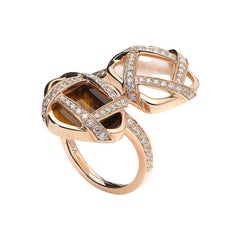Anillo de nácar y ojo de tigre