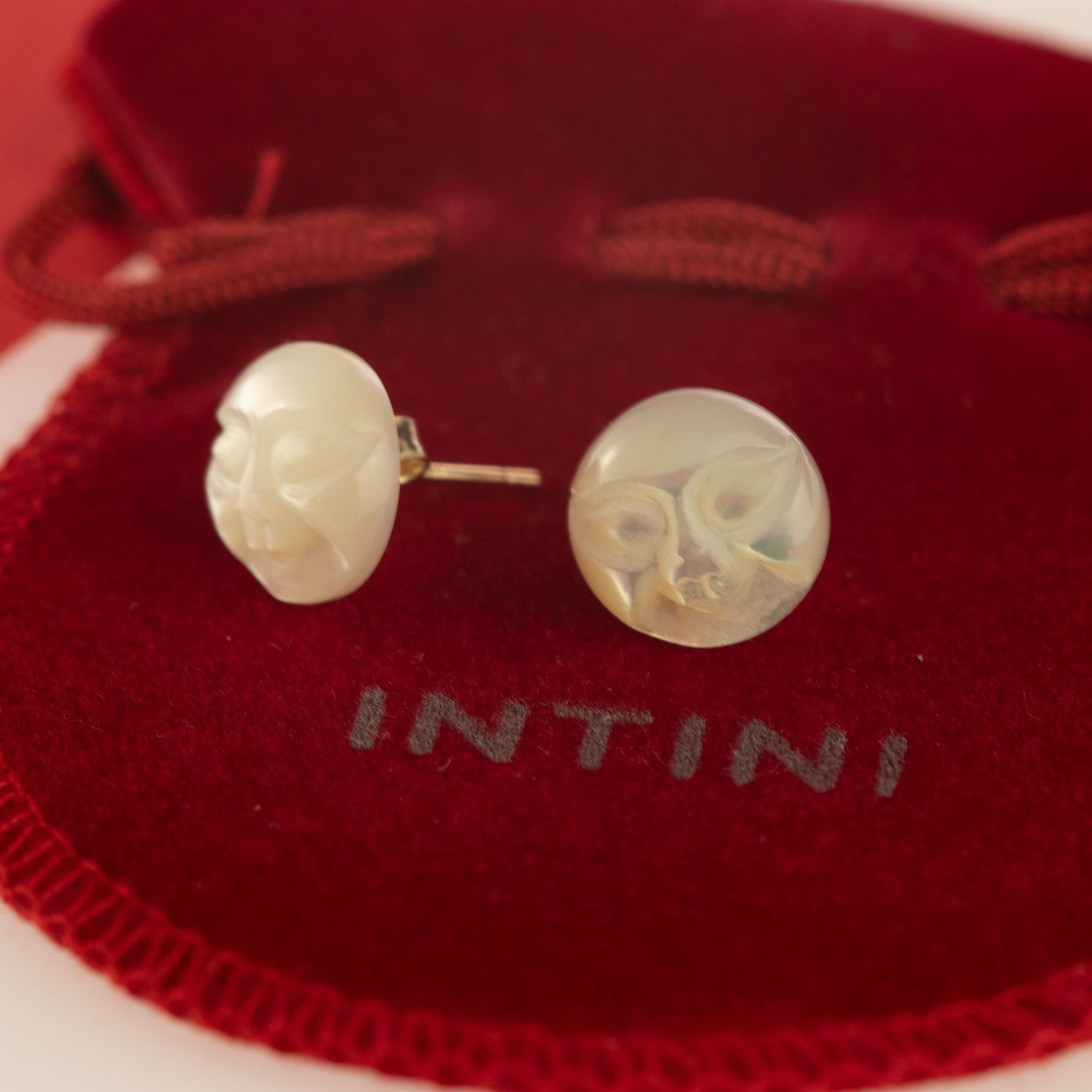 Unique natural mother of pearl earring carved with a sun / moon face . Characterized by a top quality for a signature INTINI Jewels look. Elegant and contemporary stud earrings for a marvelous look, be part of the mystique and natural power of the