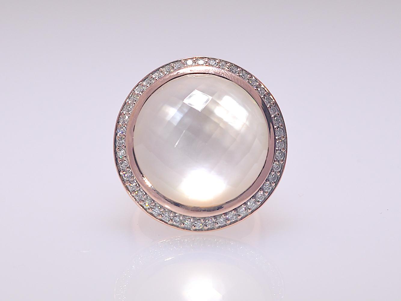Mother of Pearl & Clear Quartz .54 CTW Diamond Rose Gold 14K Ring

Stones: 
Mother of Pearl and Clear Quartz 
Natural Diamond:  .54 TCW   Color: GH   Clarity: VS1-SI2   Cut: Round
Metal: Yellow Gold 
Purity: 14K
Finger Size 7  Please Inquire if