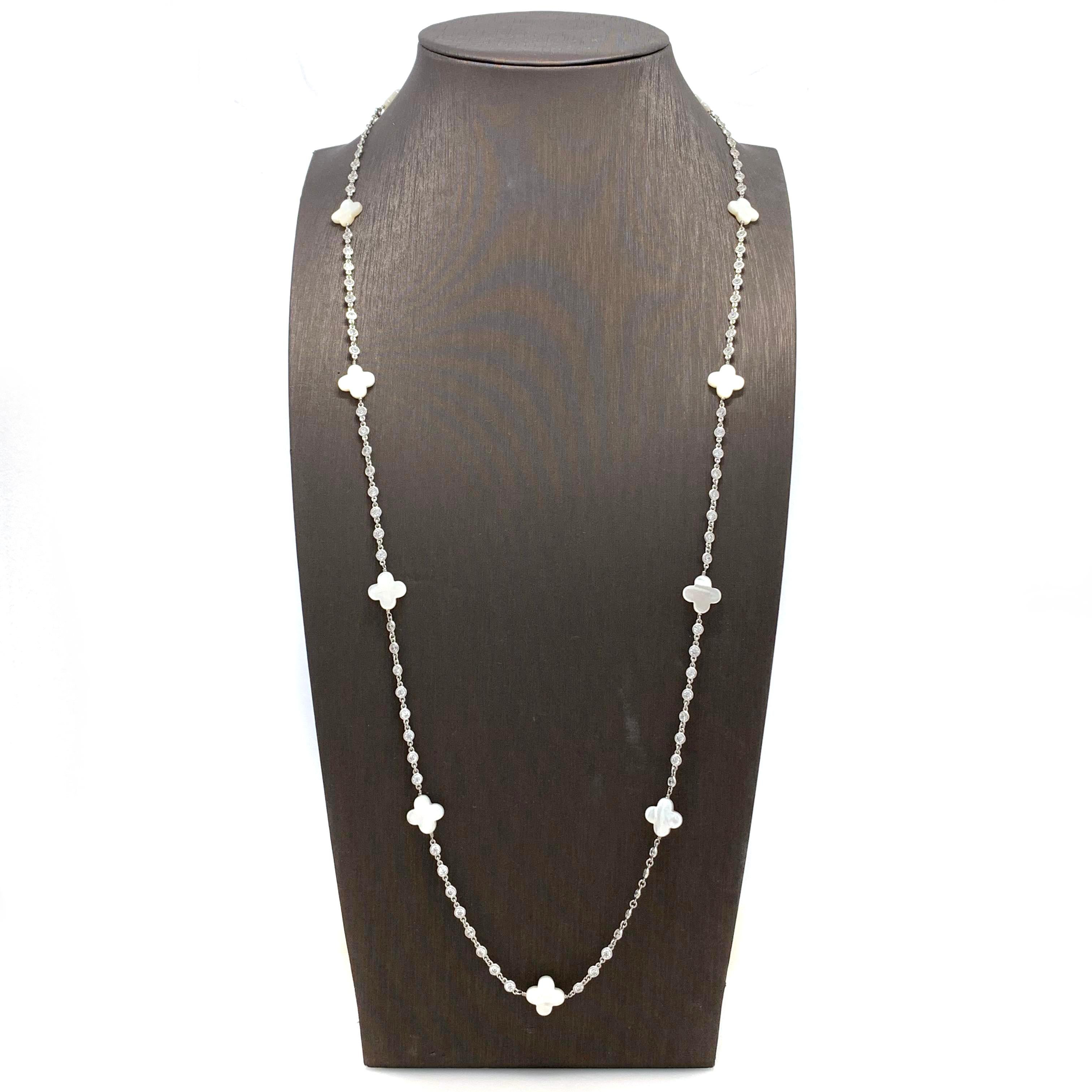 Mother of Pearl Clover Sterling Silver Long Station Necklace

The beautiful elegant necklace features 11 pieces of clover-shape mother of pearl and continuous of hand bezel-set faceted simulated diamond cz (0.10ct size each - 9.60ct size total), all