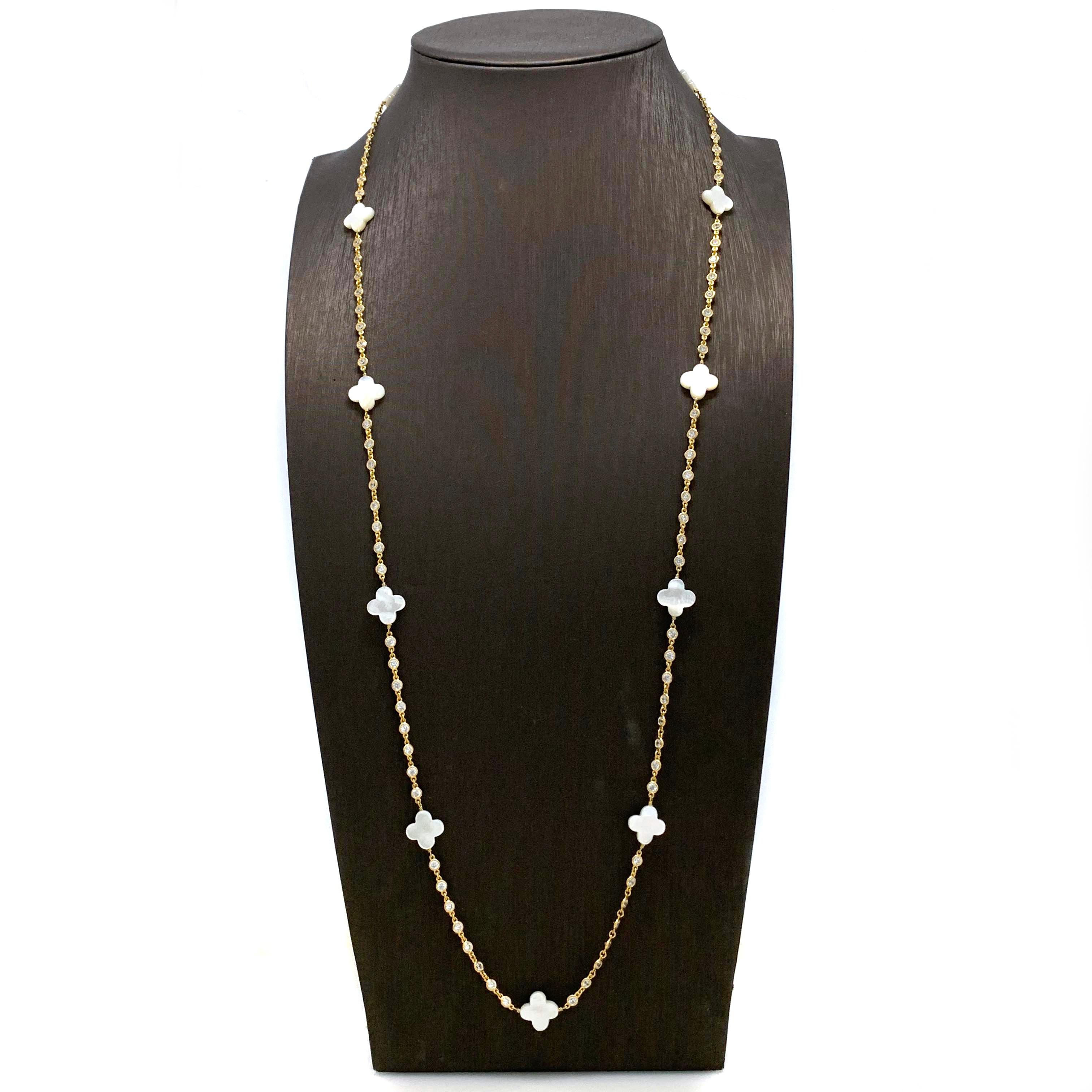 Mother of Pearl Clover Long Station Vermeil Necklace

The beautiful elegant necklace features 11 pieces of clover-shape mother of pearl and continuous of hand bezel-set faceted simulated diamond cz (0.10ct size each - 9.60ct size total), all