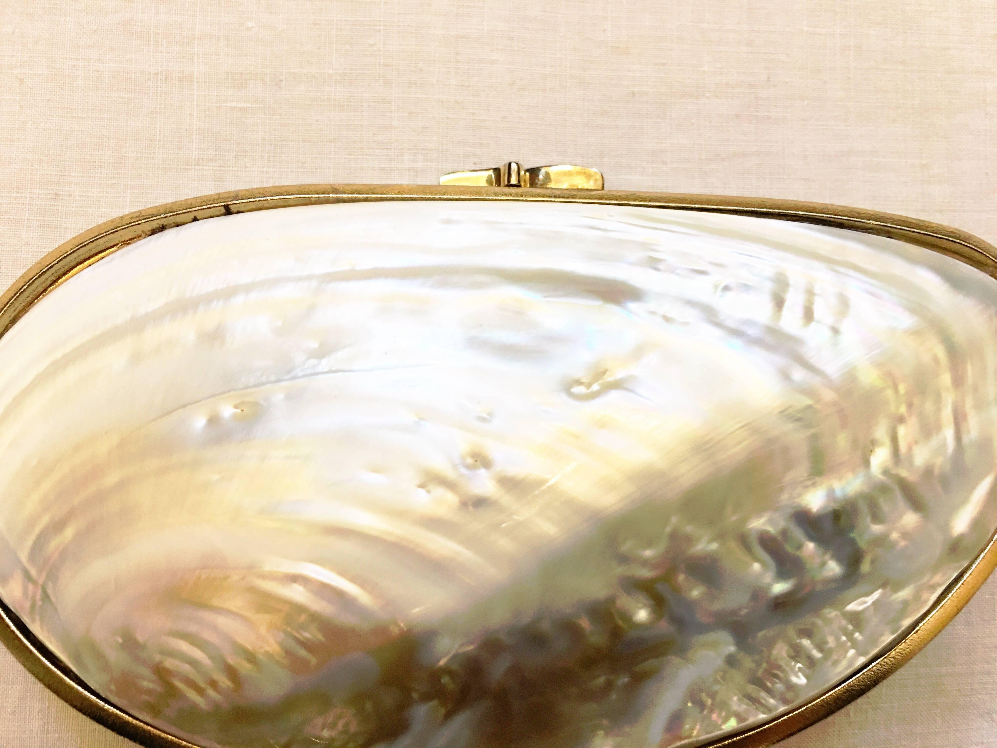pearl clutch gif