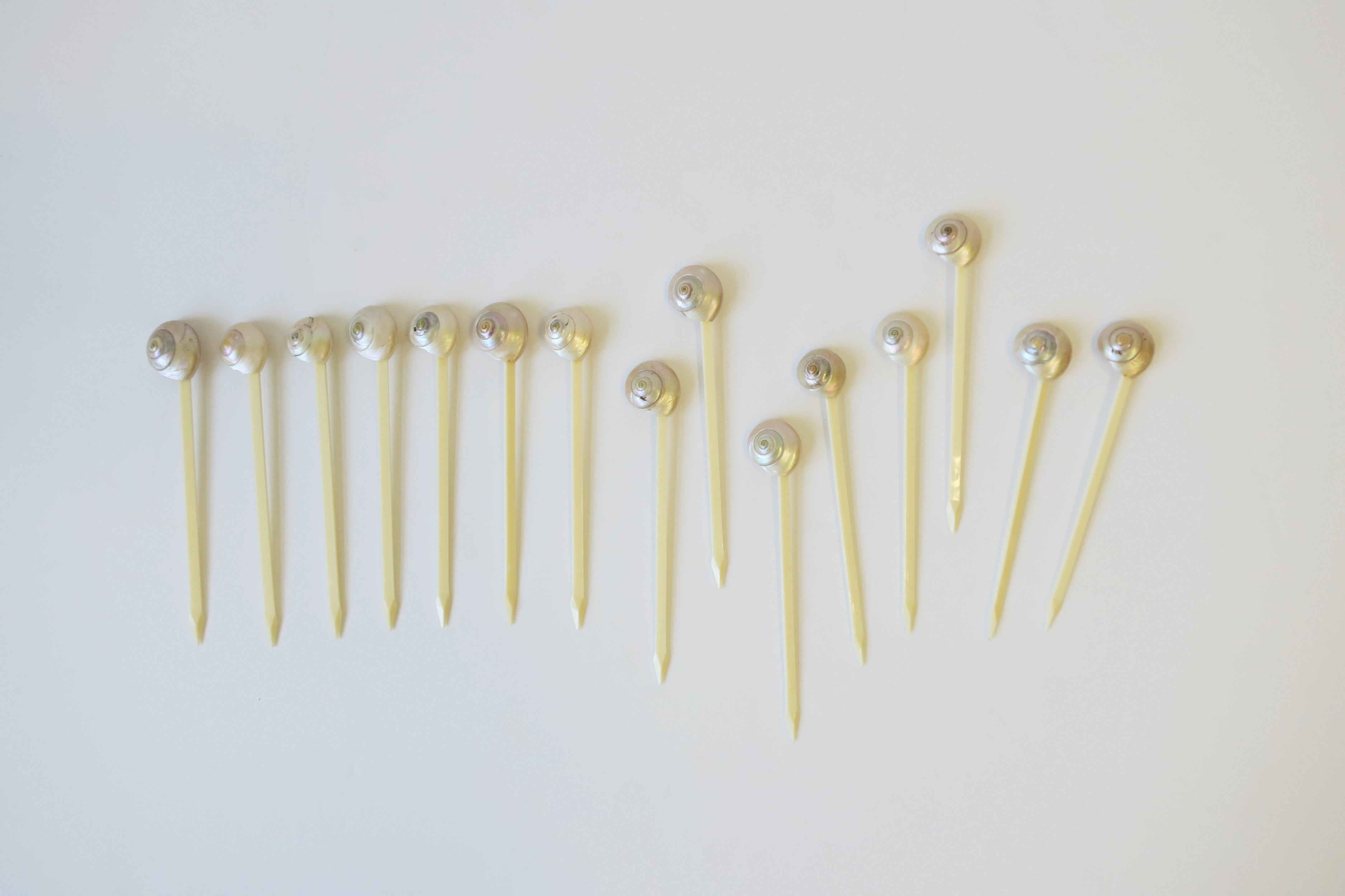 A beautiful set of fifteen (15) real natural mother of pearl seashell cocktail stirrers or appetizer picks, circa late-20th century, USA. Made in the U.S.A. as marked on each, please see image #12. A great addition to any party, dinner, bar, bar